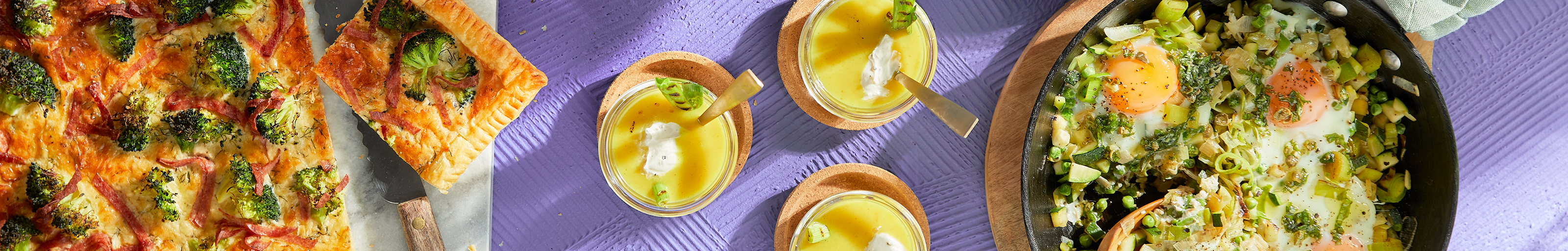 Plaatquiche met broccoli, salami en dille, romige kerriesoep met gegrilde bosui en pannetje met ei.