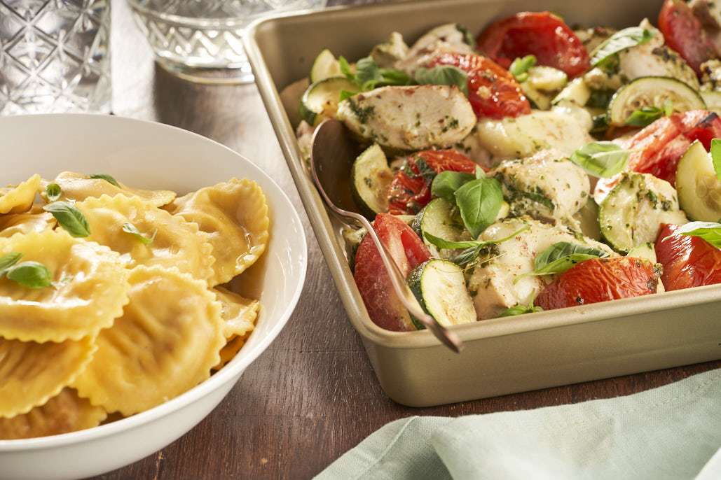 Gevulde pasta met geroosterde tomaten, kip en mozzarella