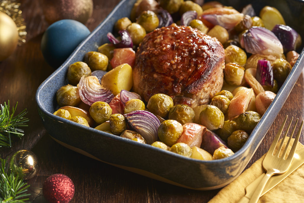 Beenham uit de oven met tricolore aardappels, spruitjes en appel