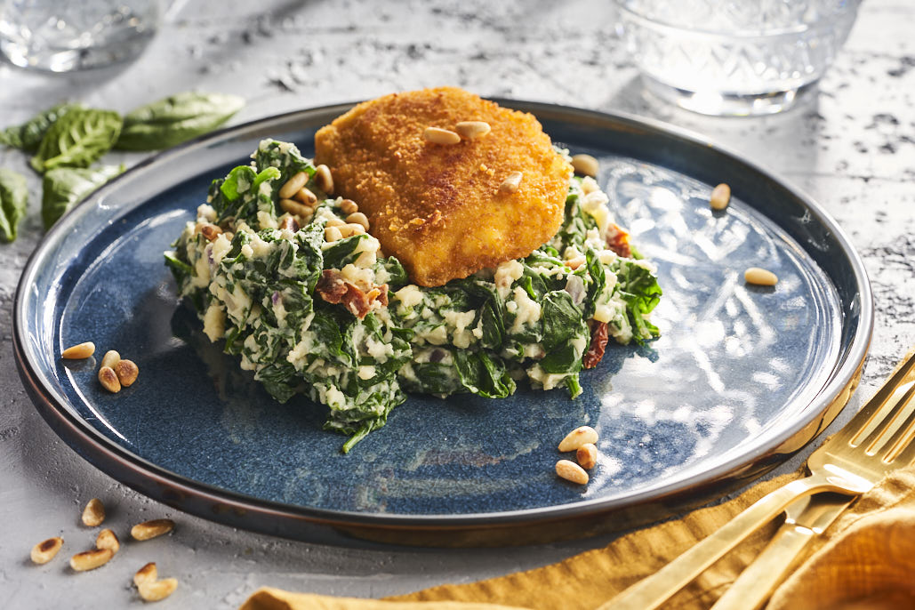 Spinaziestamppot met kaasschnitzel