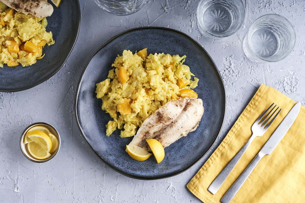 Frisse spitskoolstamppot met perzik, kerrie en pangasiusfilet