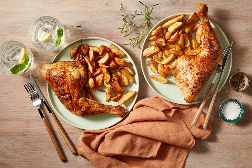 Geroosterde aardappelpartjes met rozemarijn en kippenbout