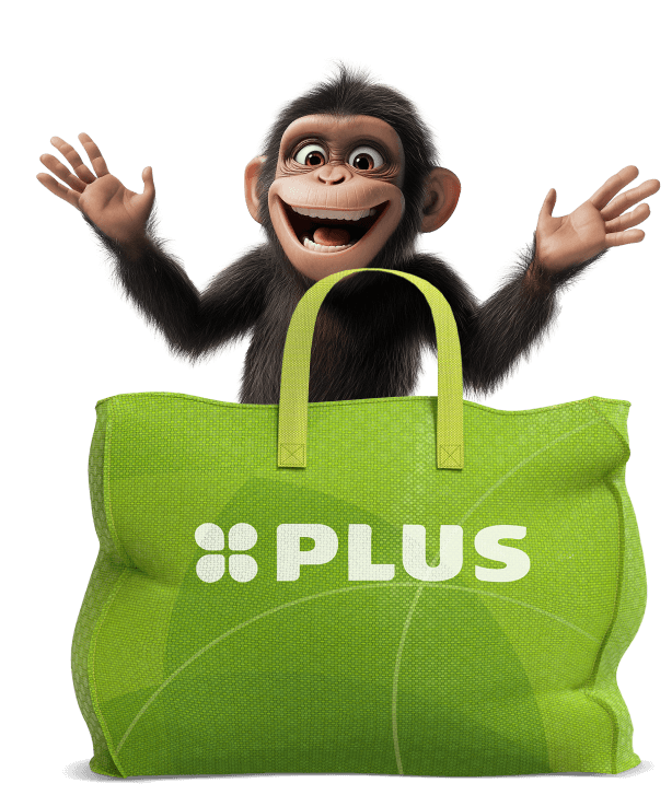 Groene PLUS-tas gevuld met een vrolijk aapje.