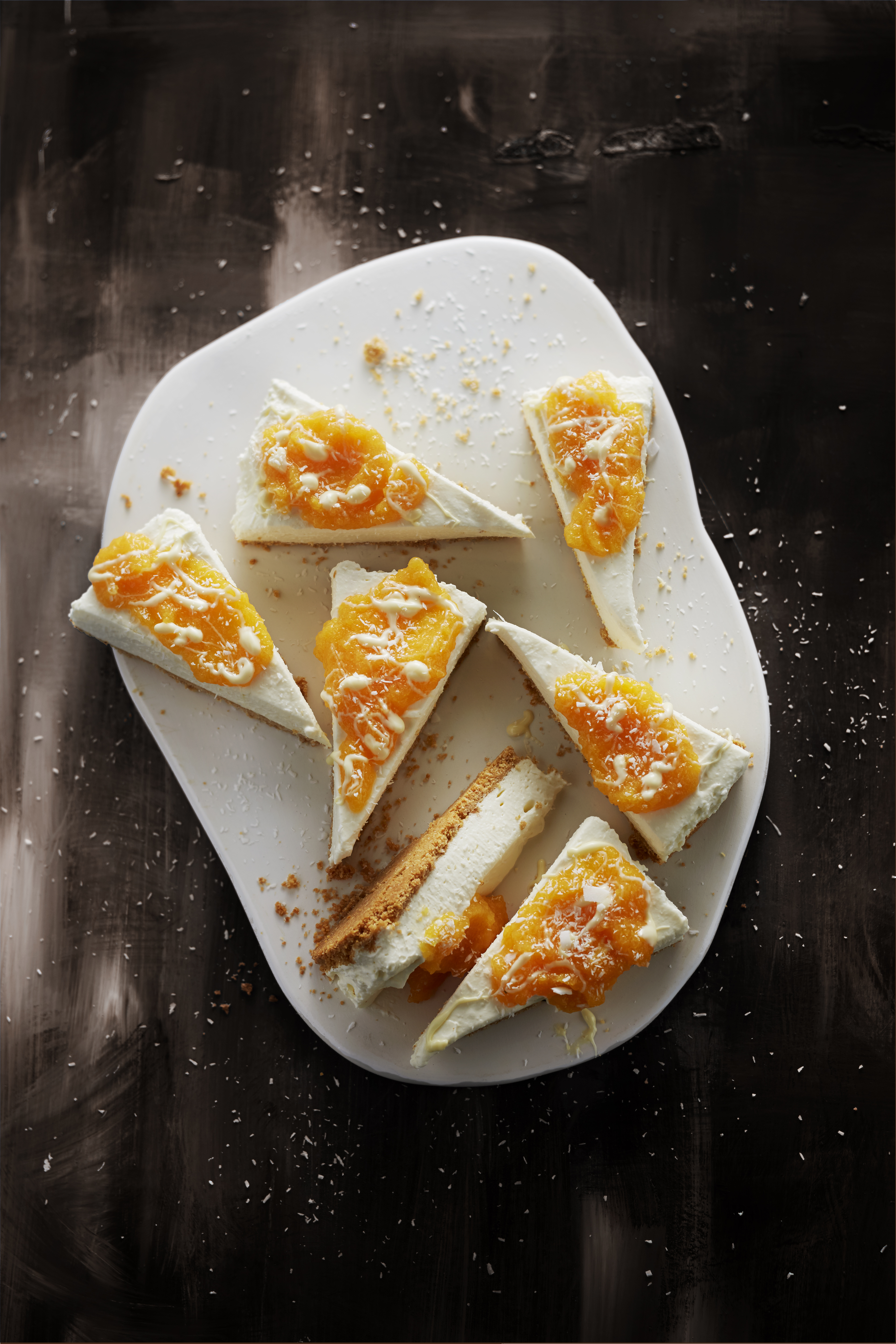 Kokos-cheesecake met mangocoulis