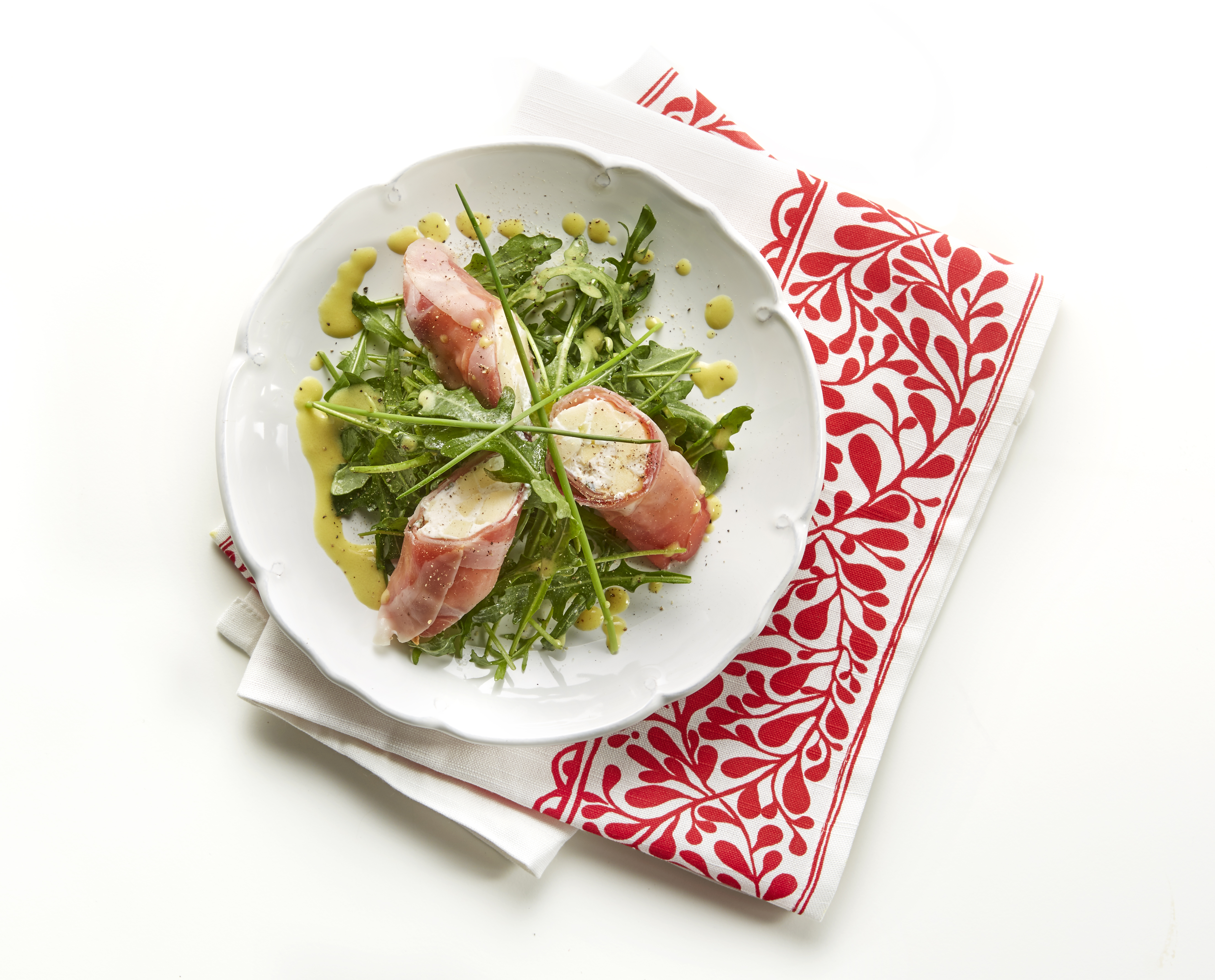 Rucolasalade met hamrolletjes