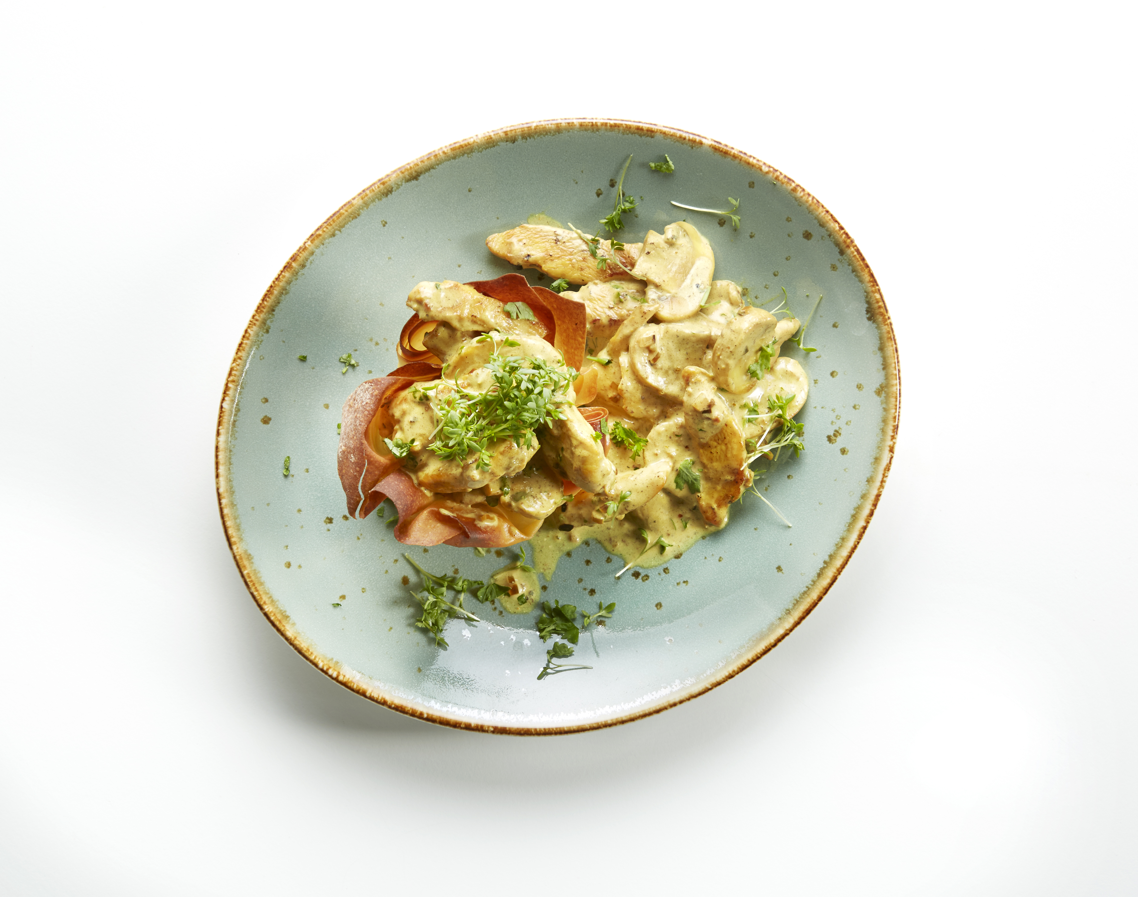 Filopasteitjes met kalkoenreepjes en paddenstoelen