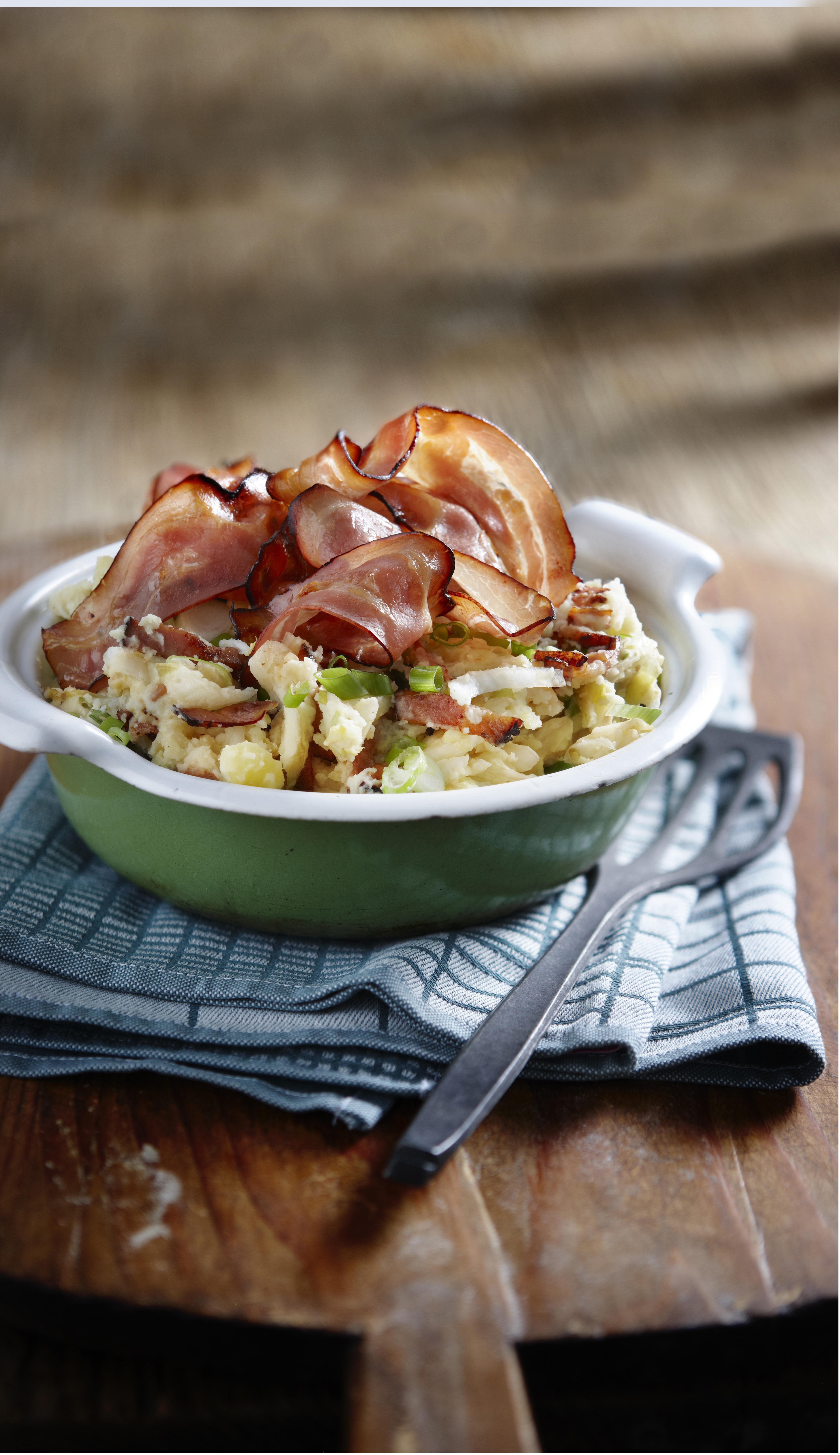 Witlofstamppot met katenspek en bosui