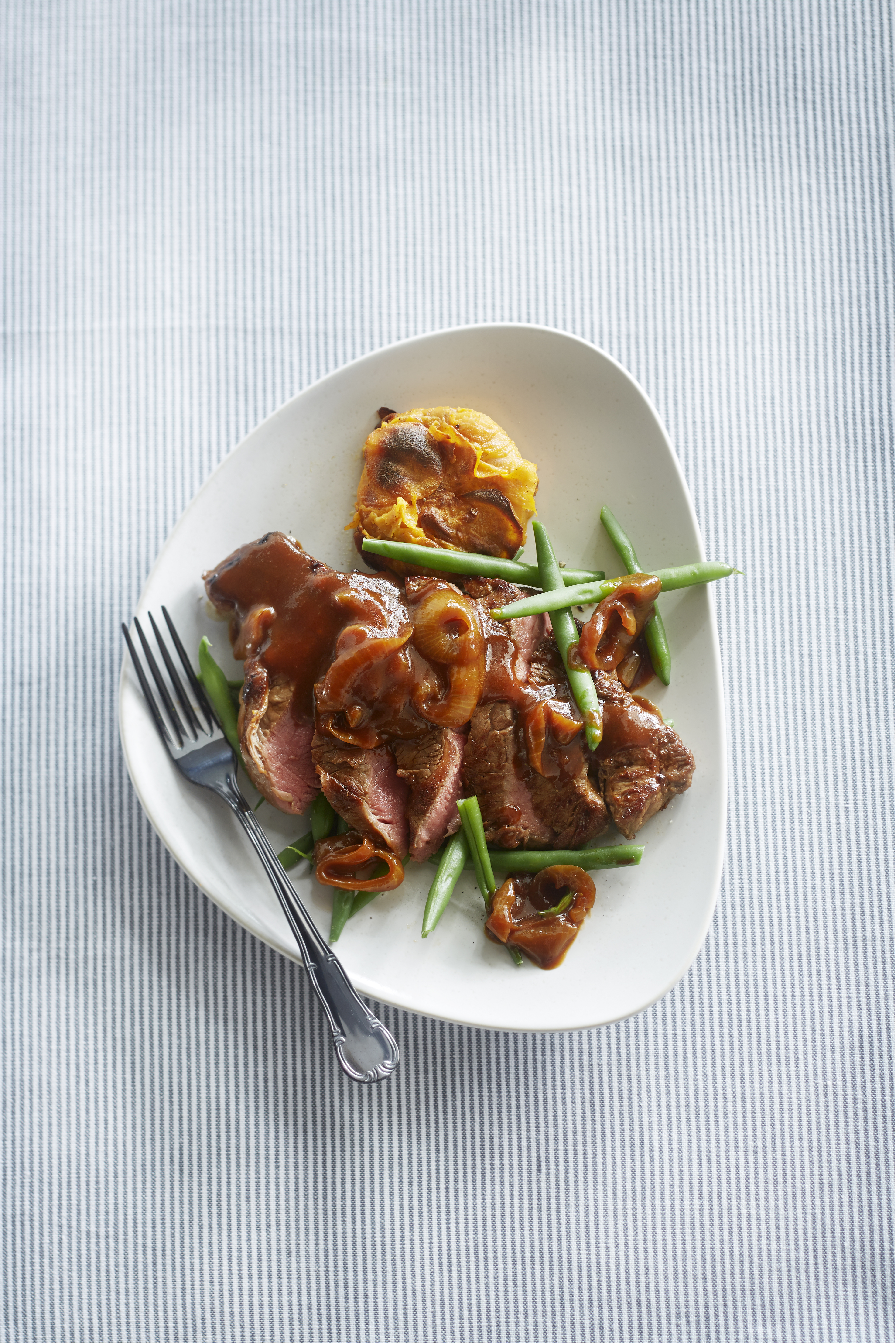 Ribeye met specerijen en gratin van zoete aardappel