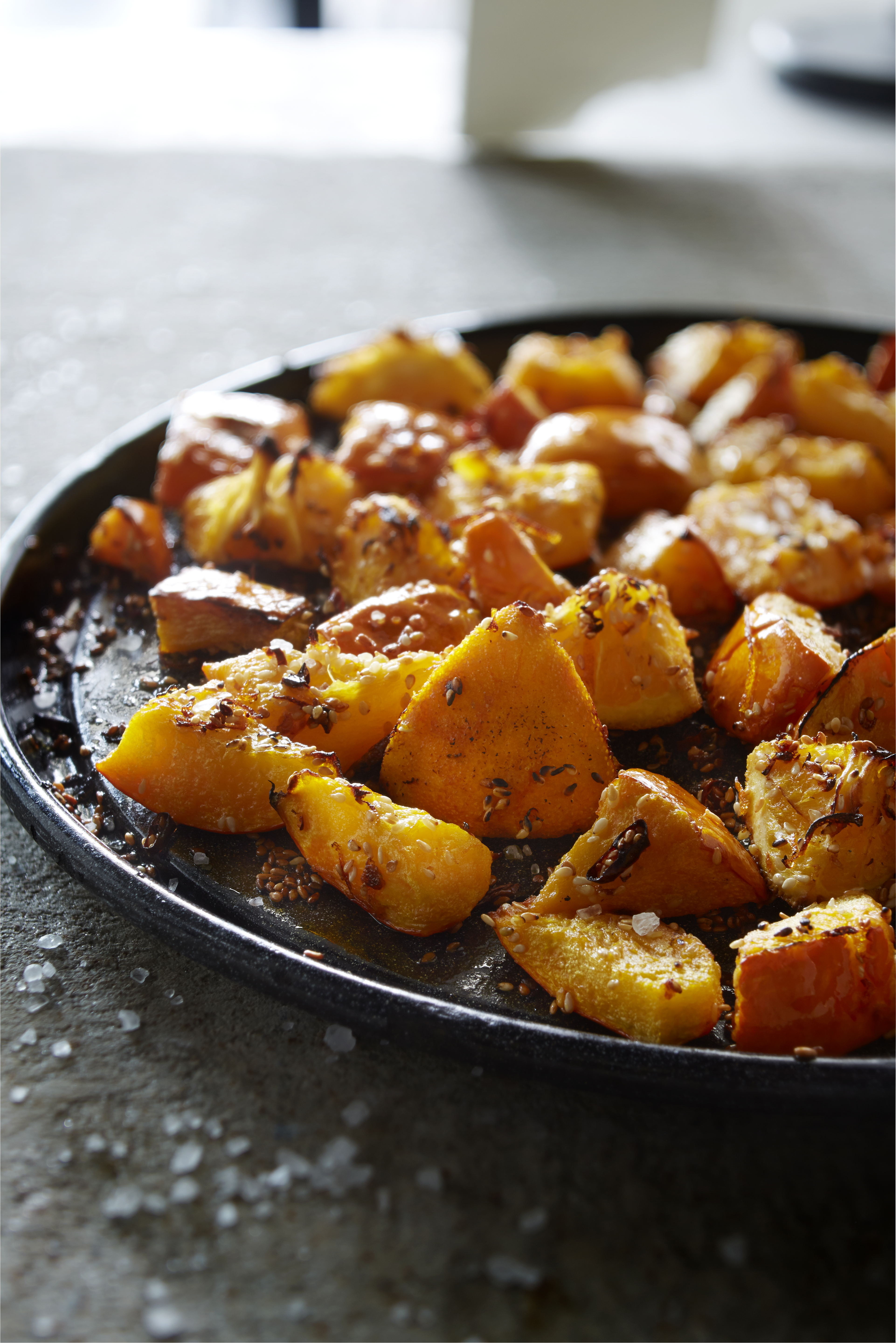 Geroosterde pompoen met sesam en sinaasappel