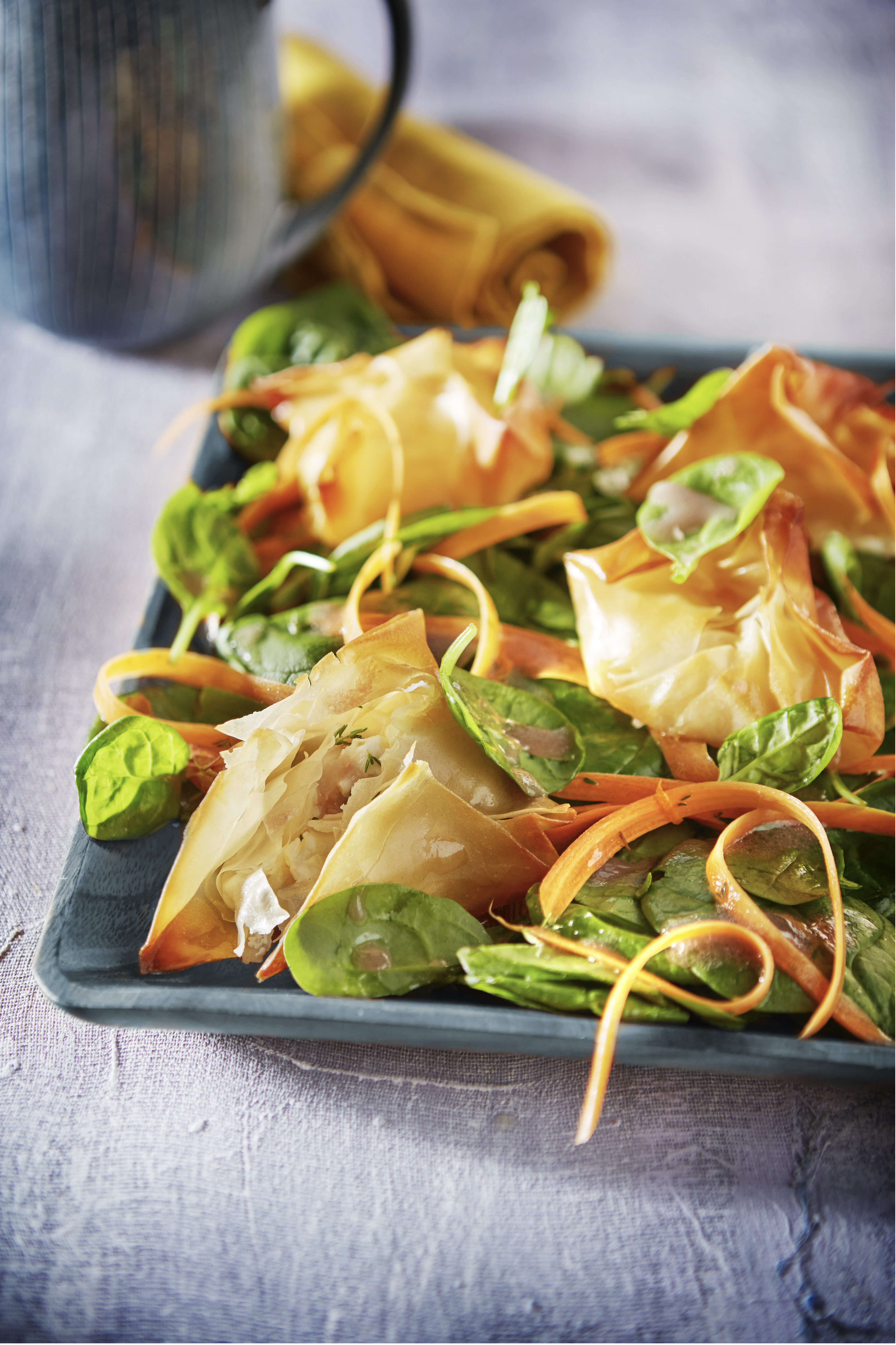 Spinaziesalade met geitenkaaspakketjes