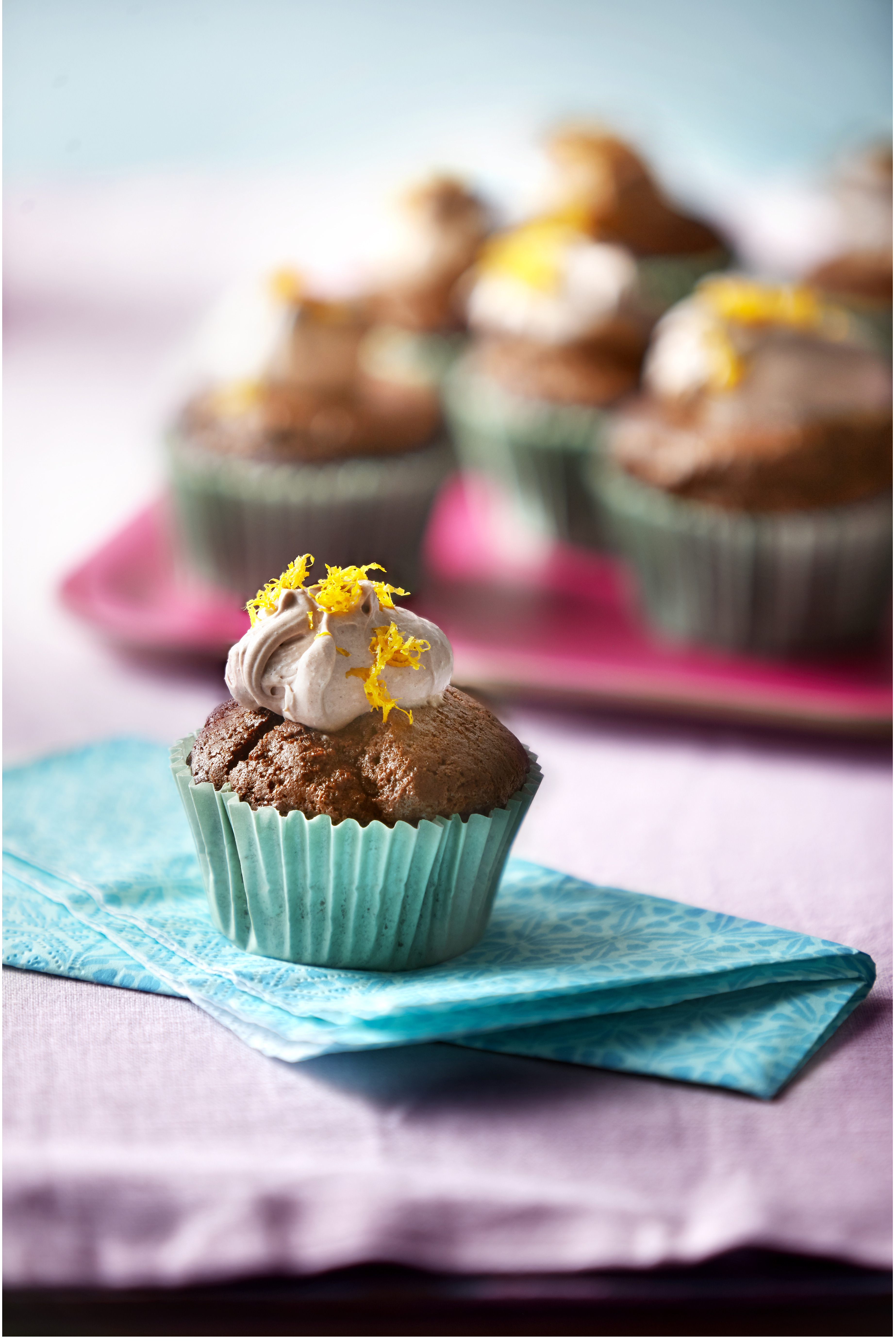 Chocolade cupcakes met sinaasappeltopping