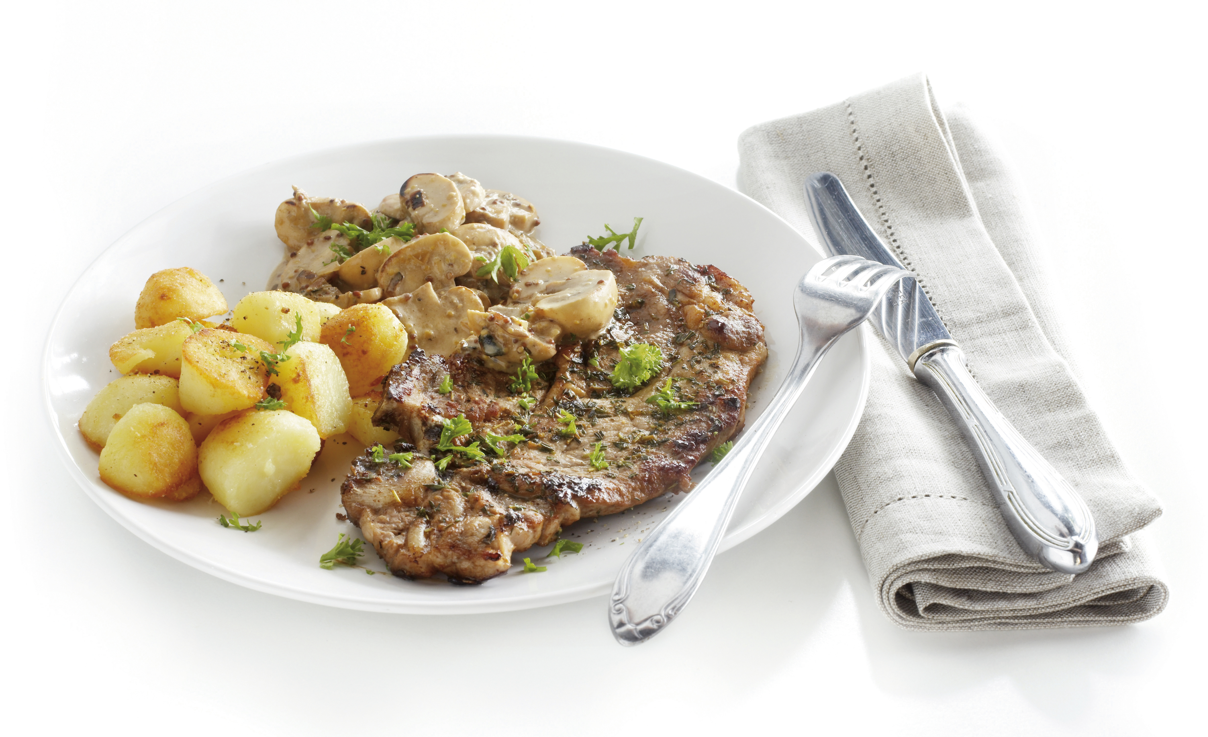 Gegrilde karbonade met champignonsaus