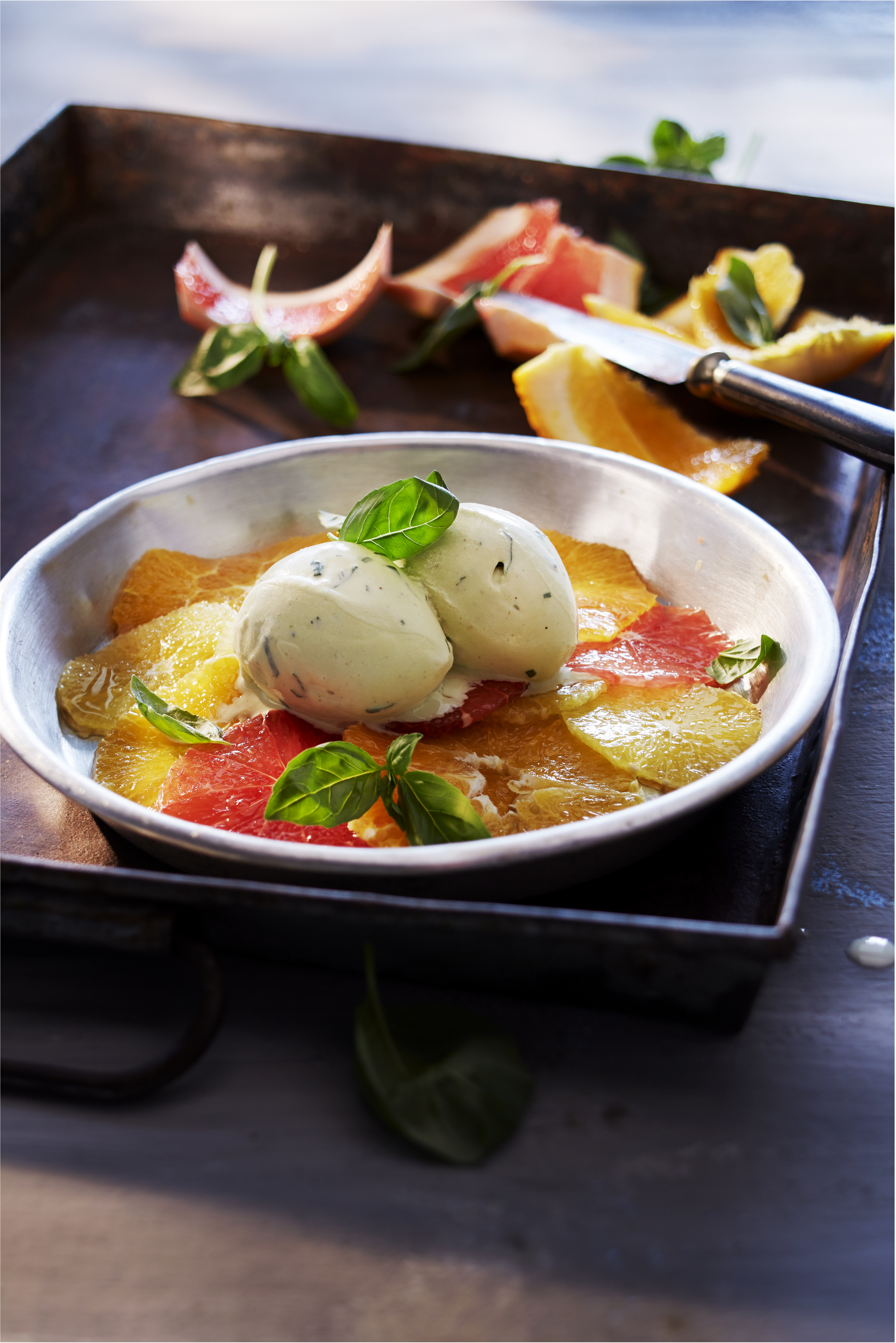 Citruscarpaccio met basilicumijs