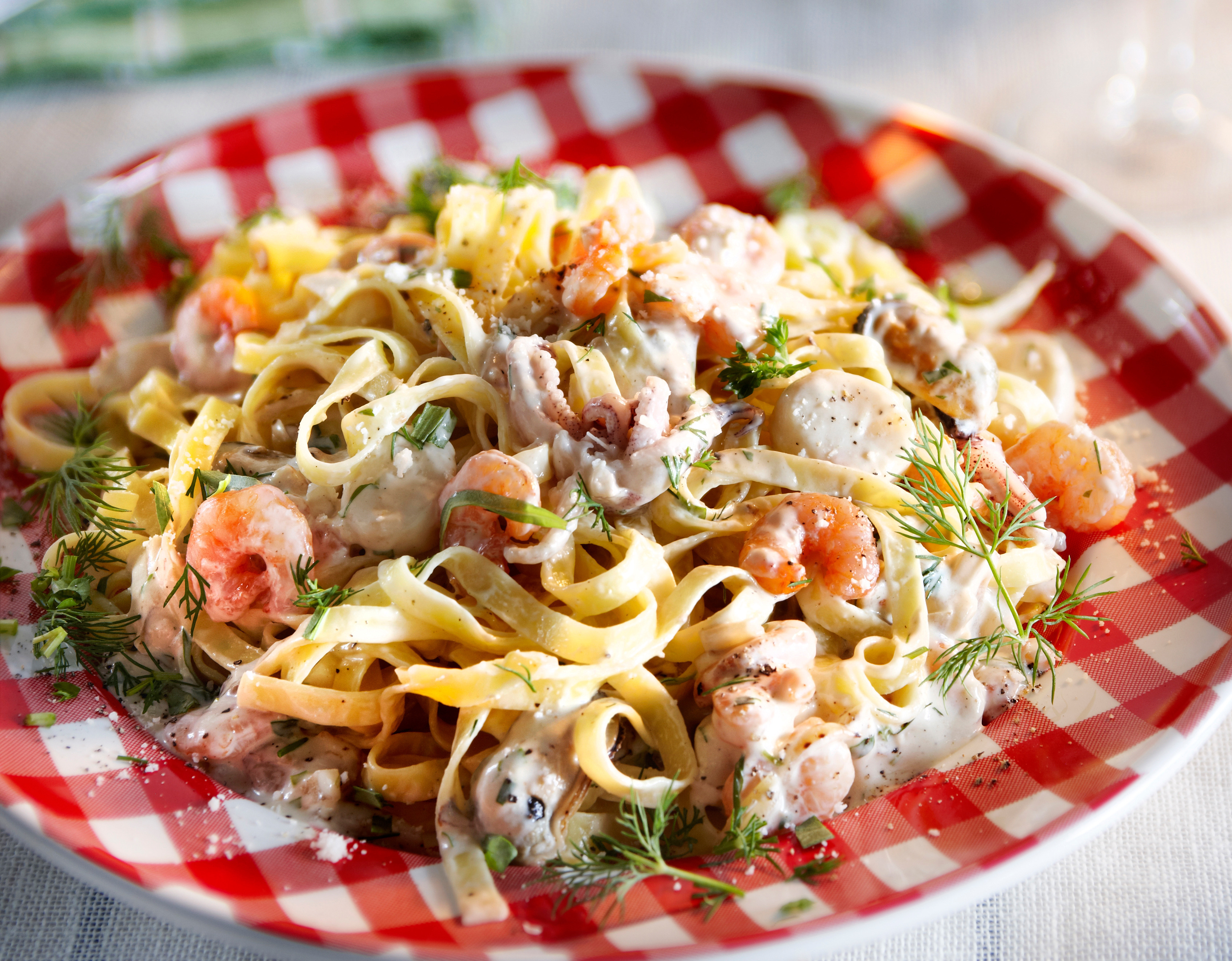 Tagliatelle met zeevruchten en wittewijnsaus