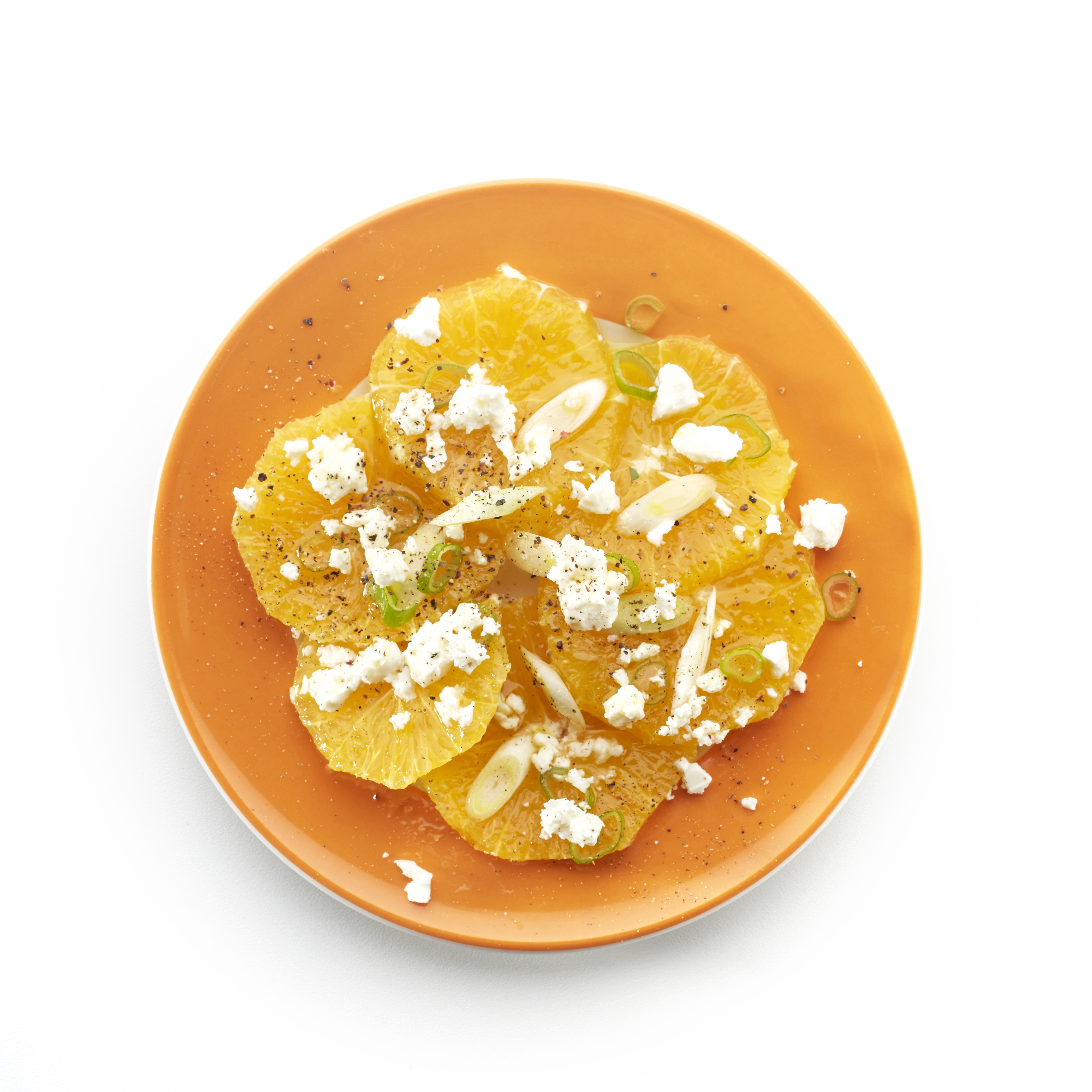 Sinaasappel met bosui en geitenkaas