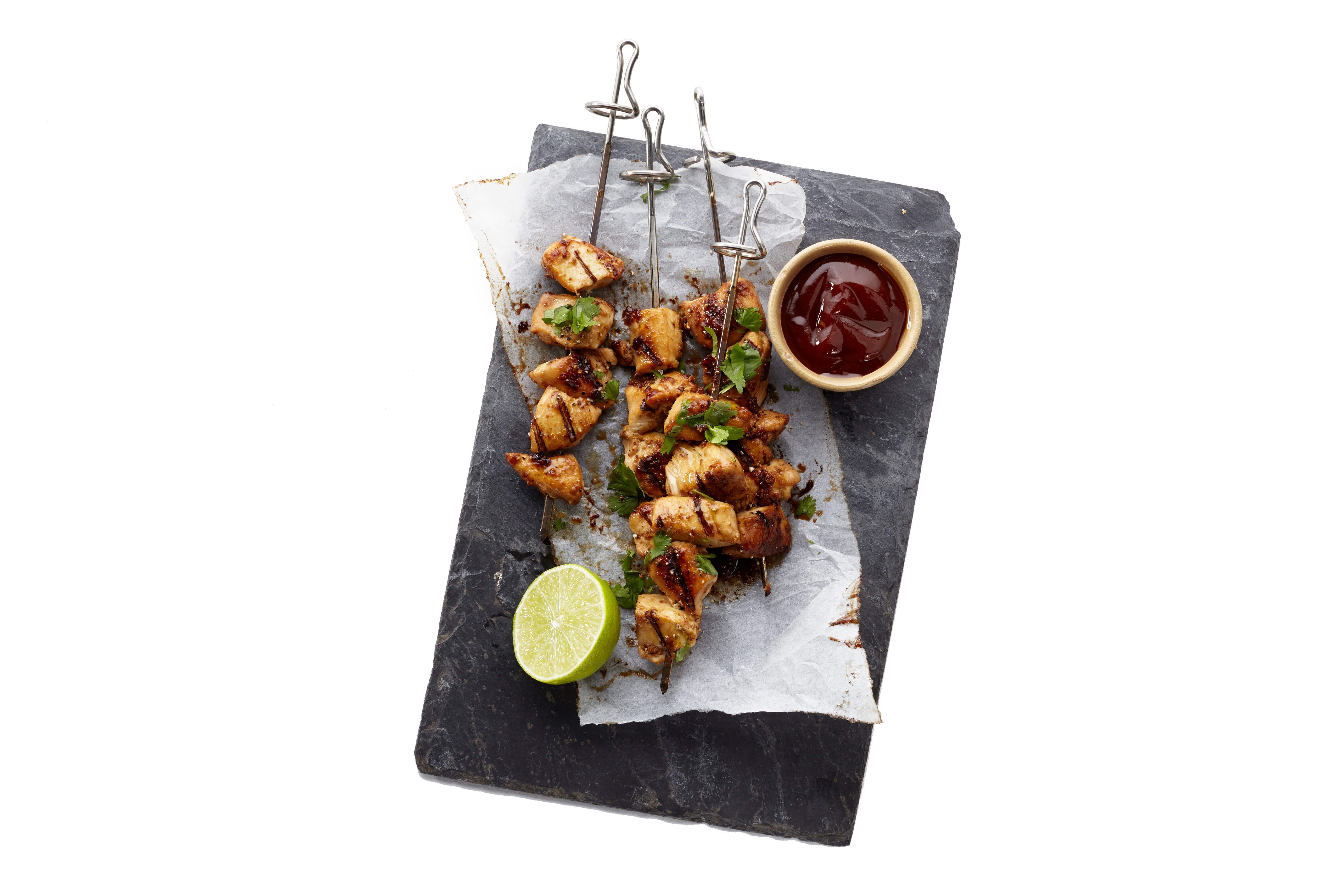 Geroosterde kipspies met limoen en koriander