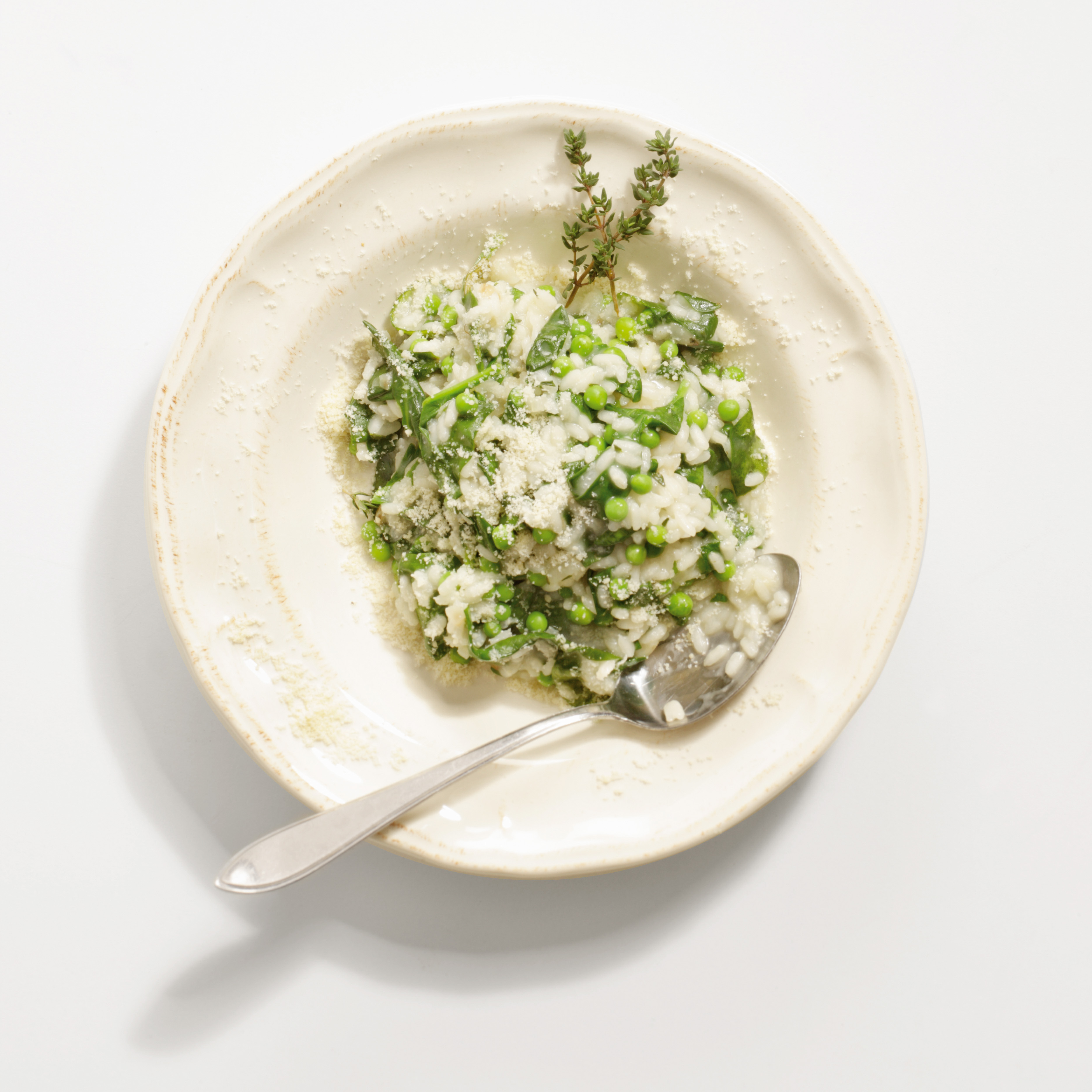 Risotto met spinazie en doperwten