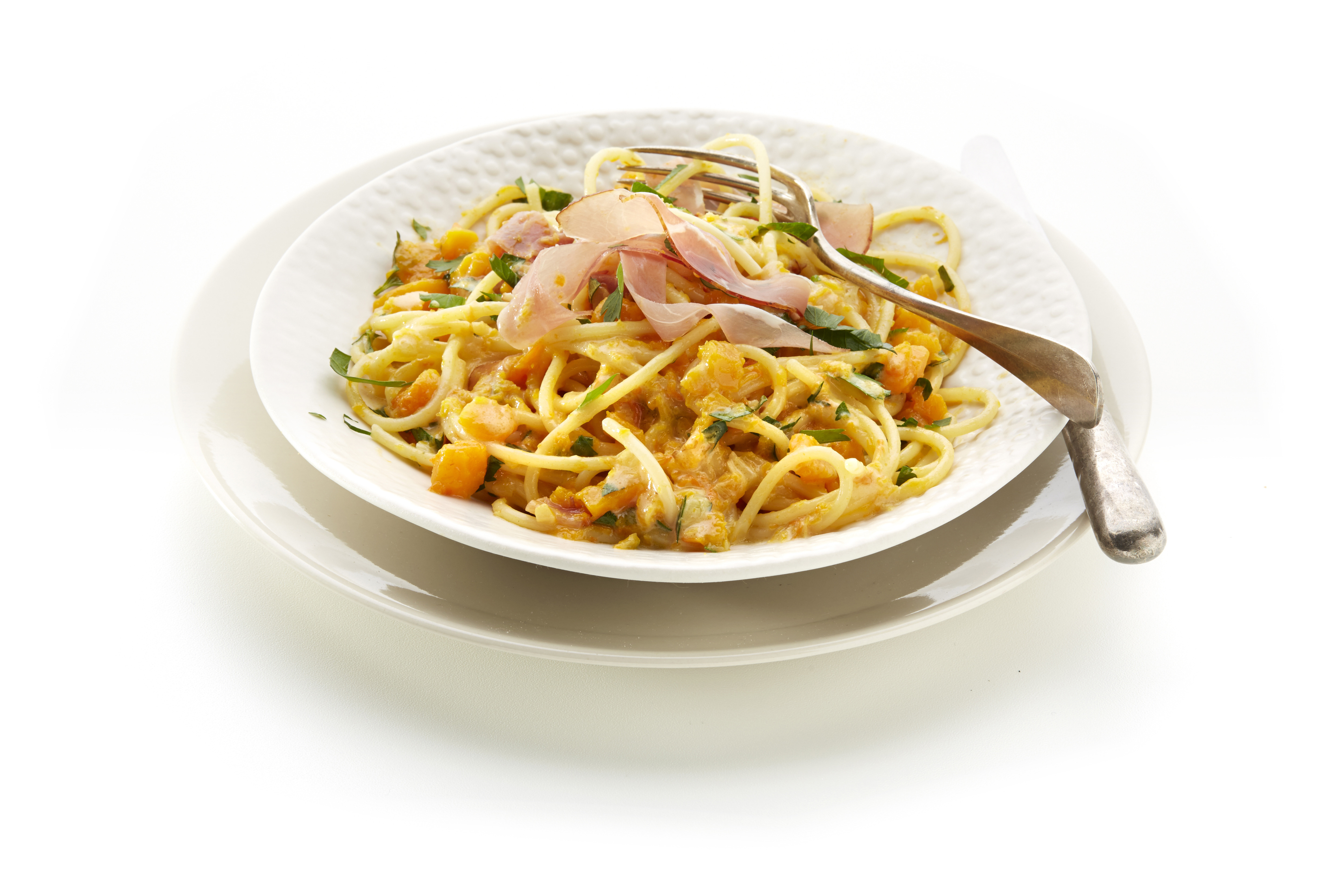 Pasta met pompoen en rauwe ham