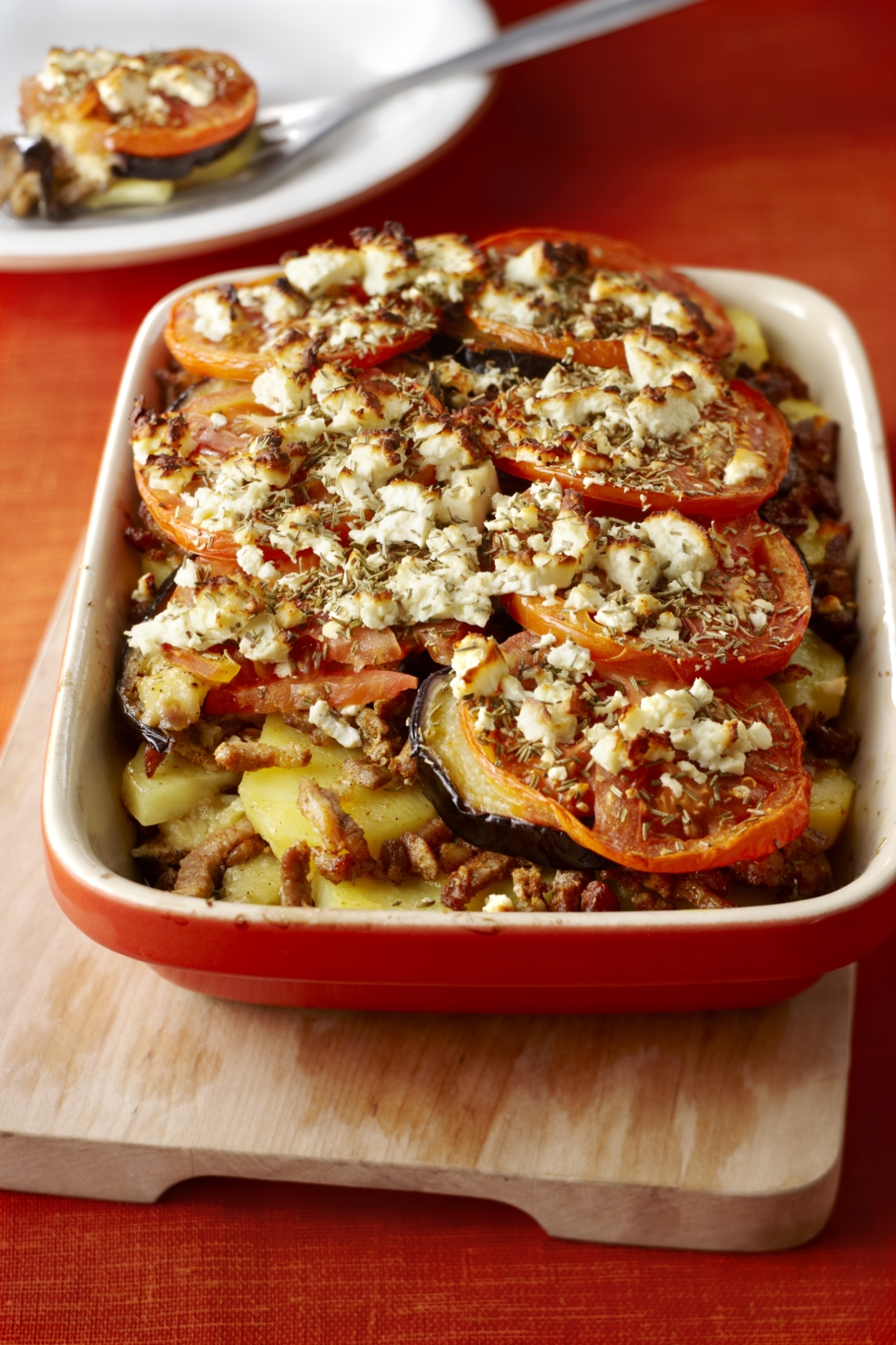 Ovenschotel met shoarma, aubergine en tomaat