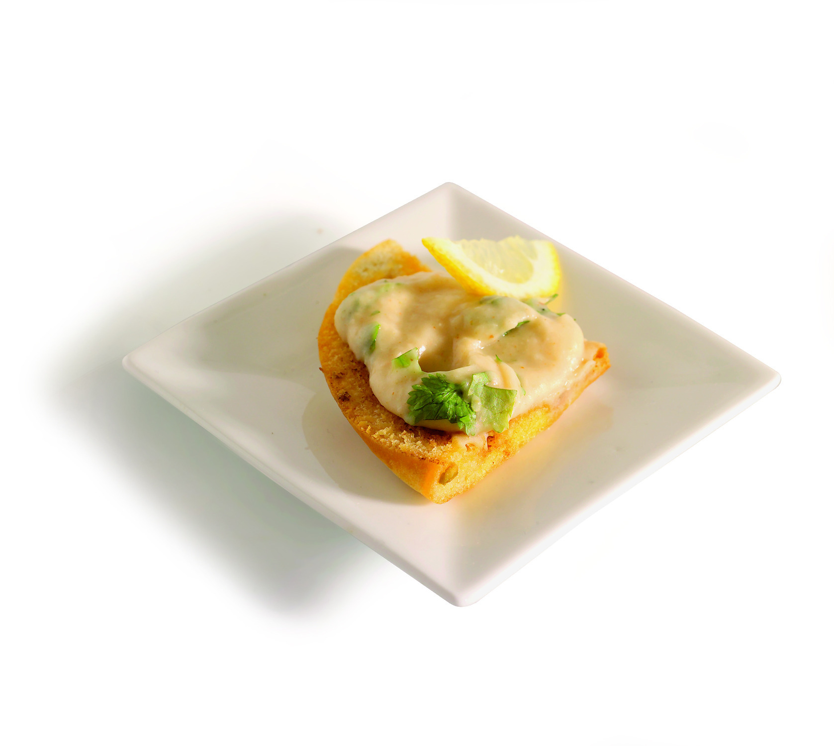 Geroosterde pitapuntjes met hummus