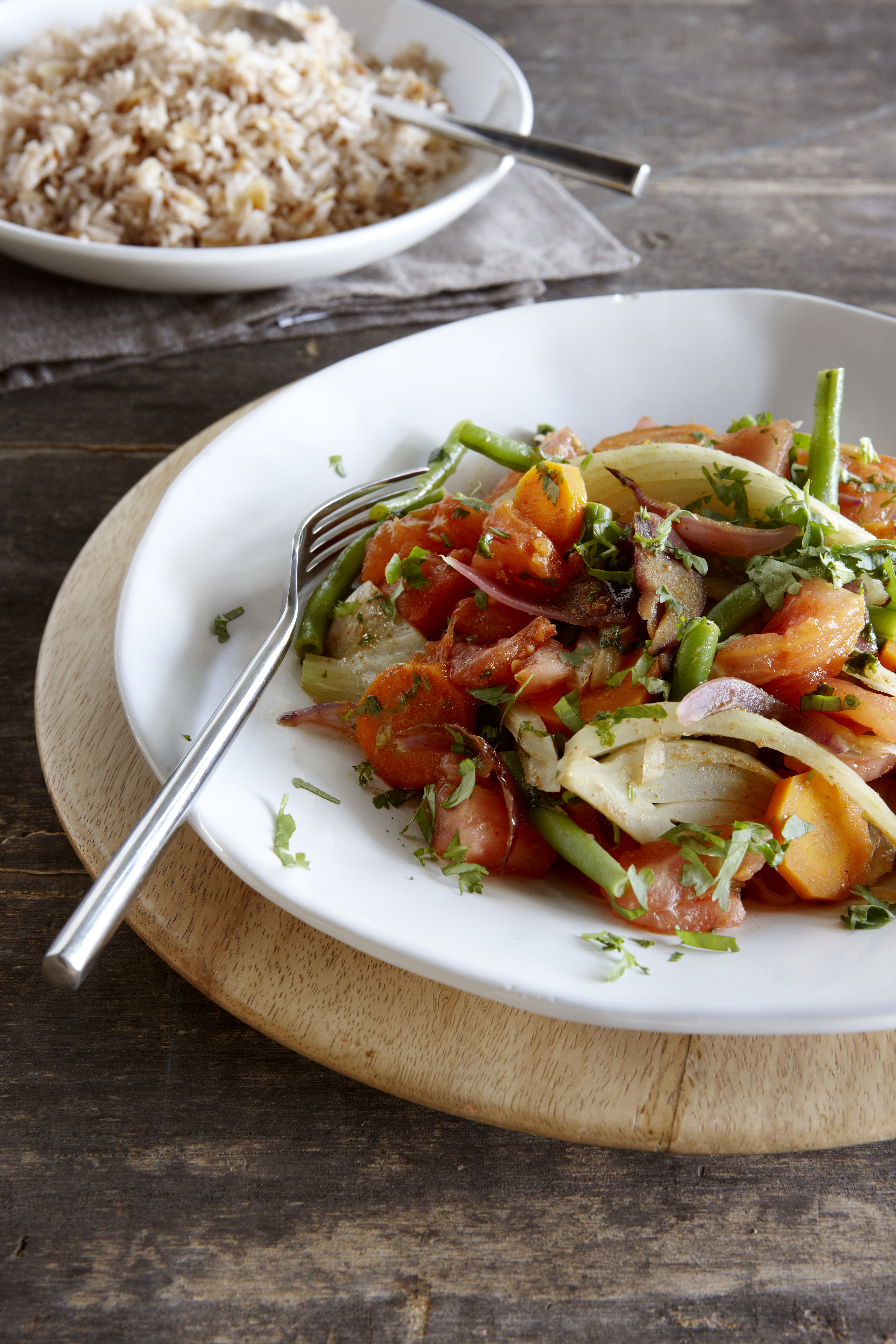 Gekruide groentestoof met amandelrijst