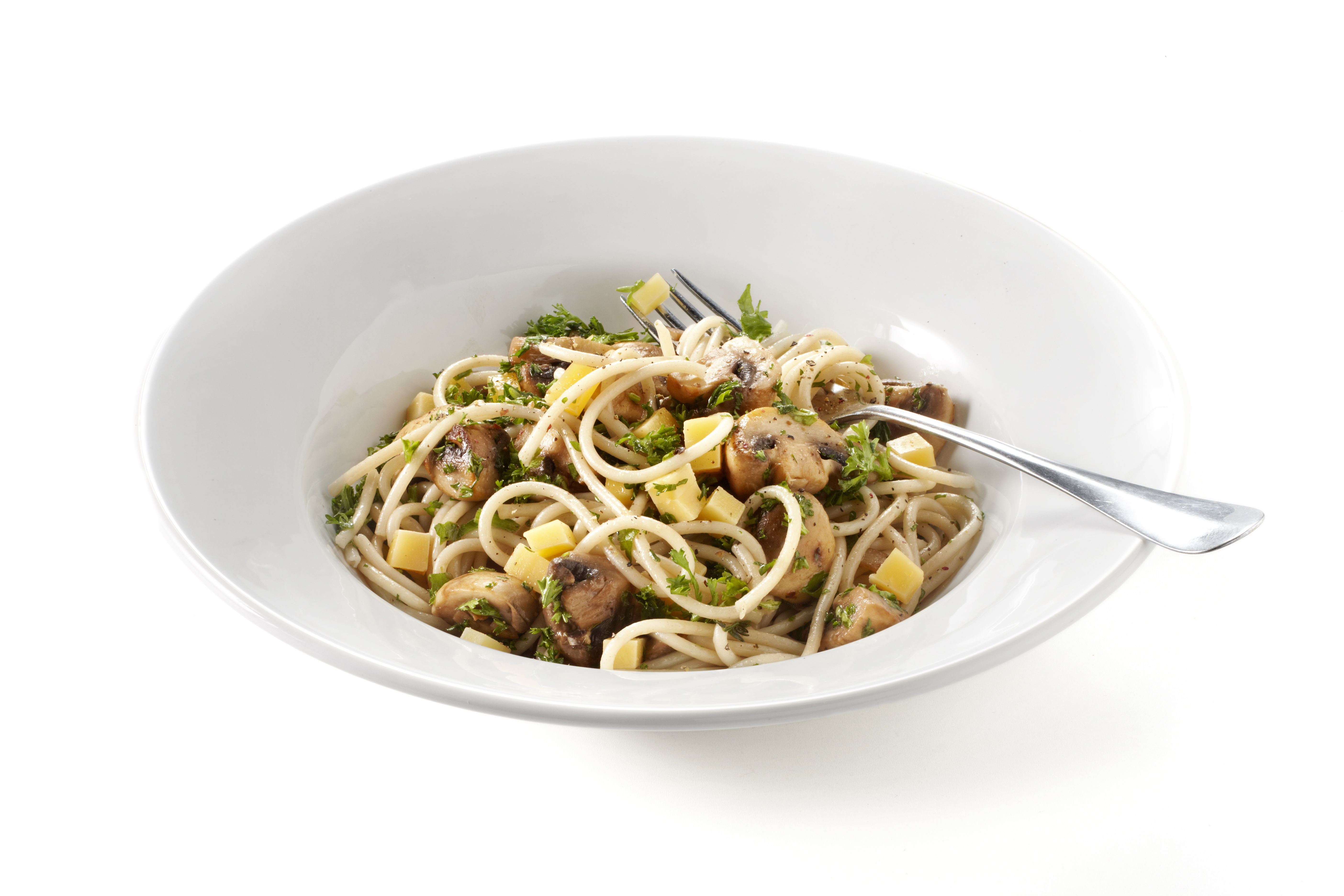 Spaghetti met paddenstoelen, kaas en kruiden