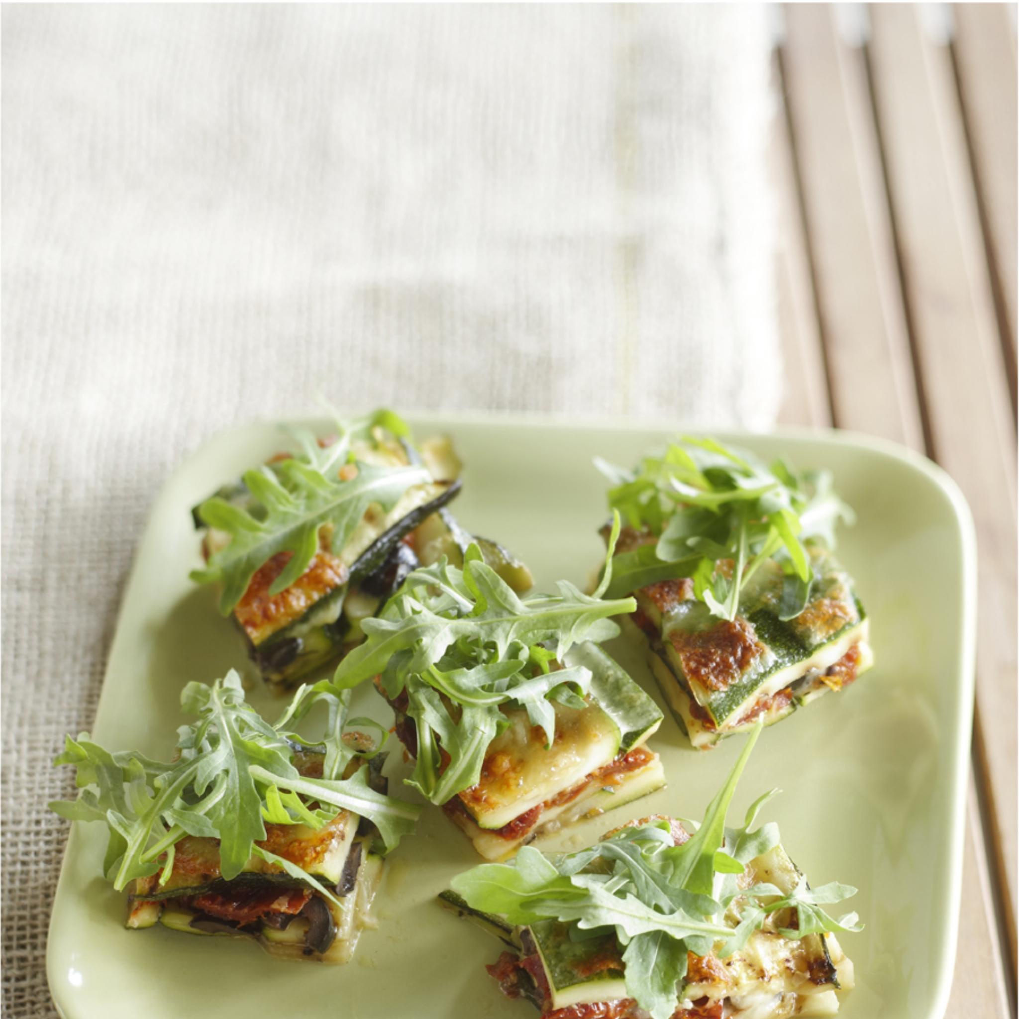 Courgettegratin met tomaat en olijven