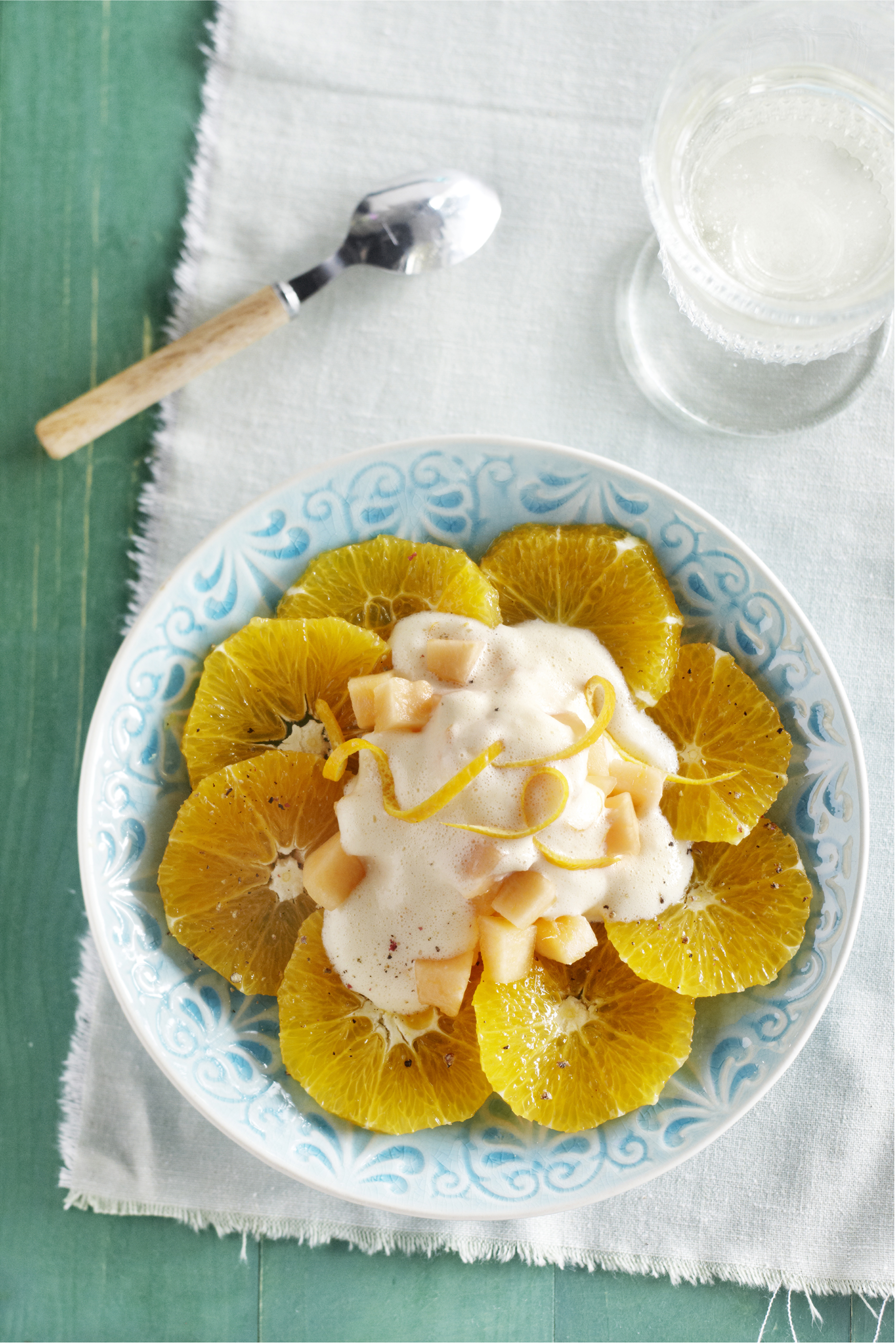 Sinaasappelcarpaccio met meloen en proseccosabayon