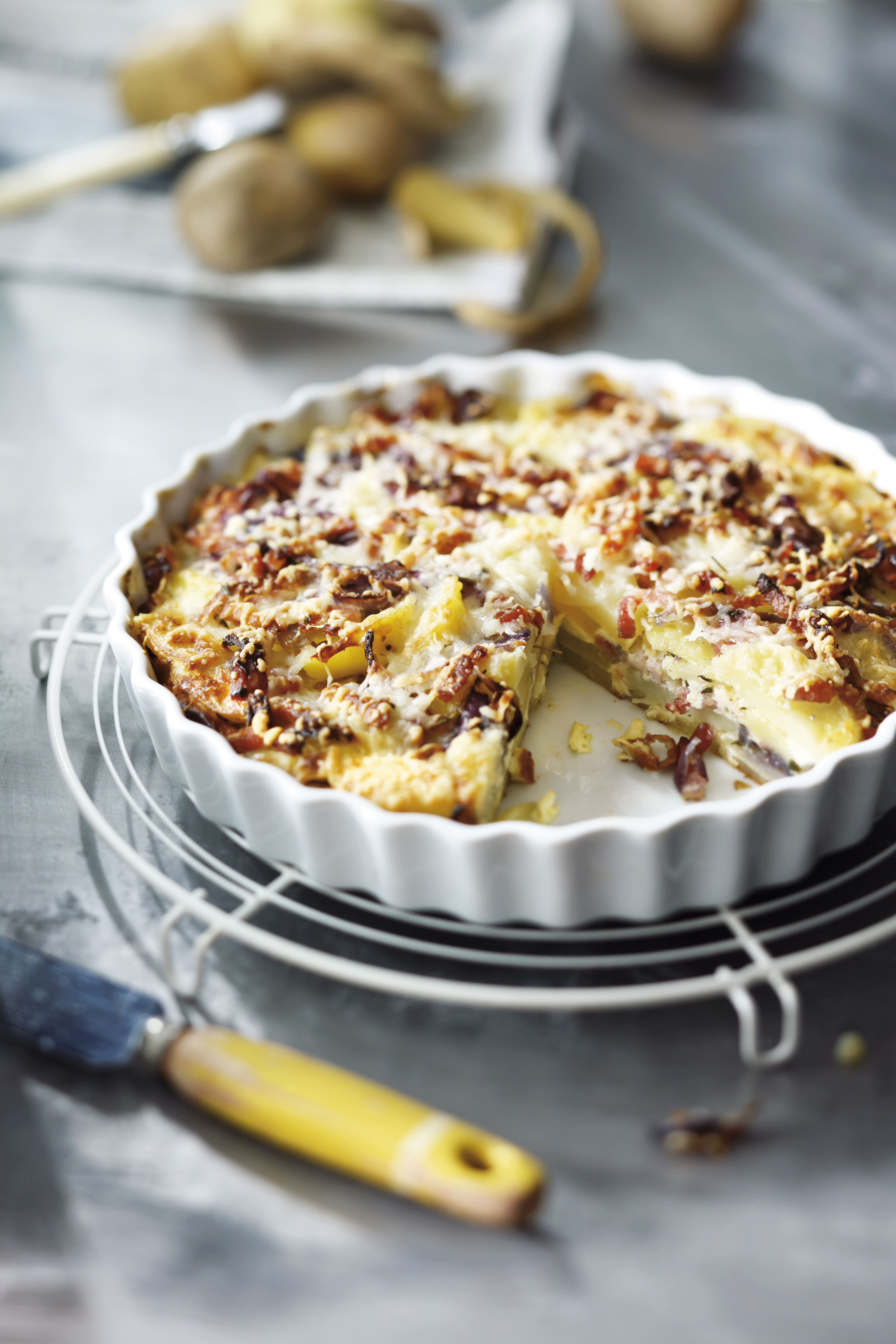 Gegratineerde aardappeltaart met spek