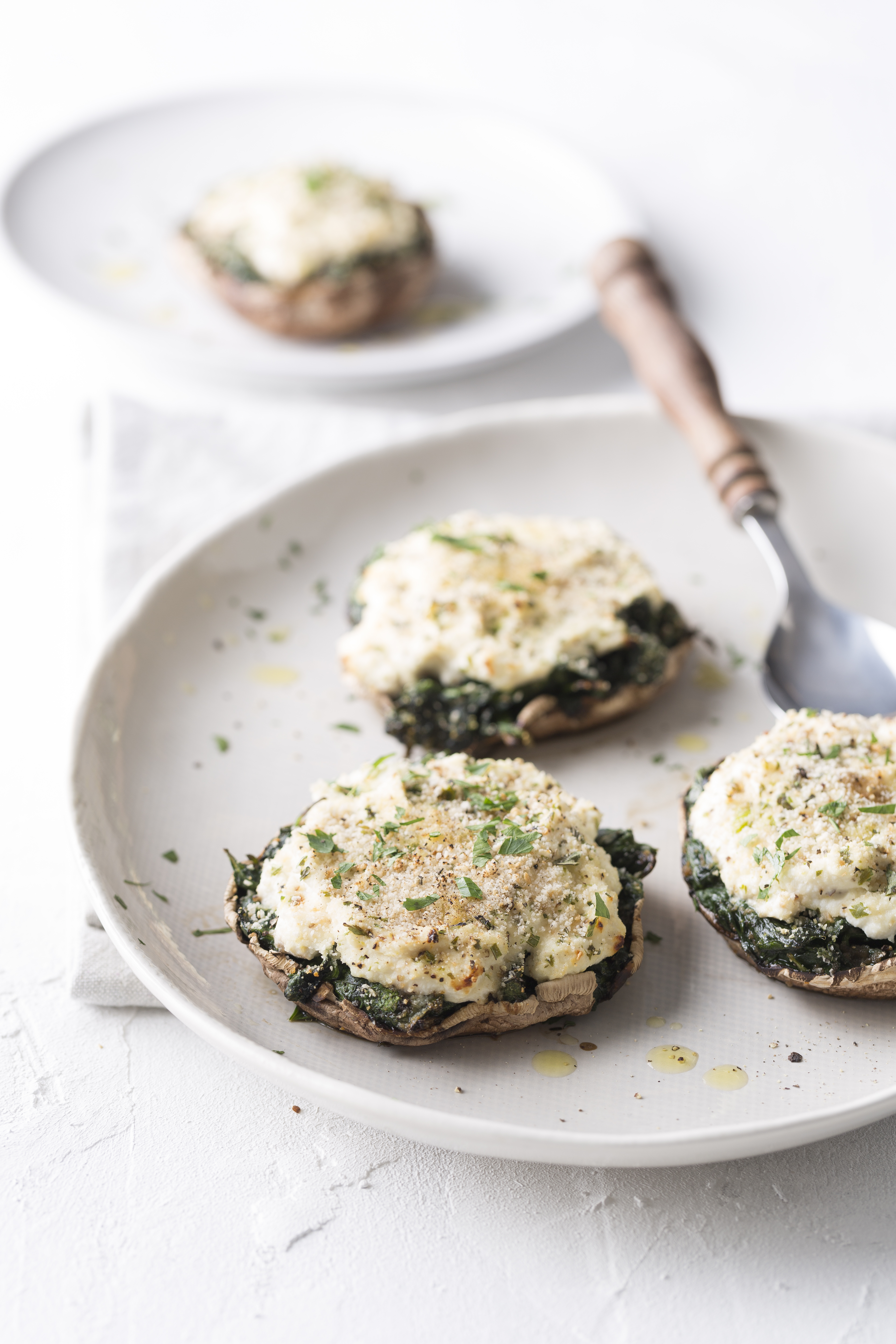 Portobello met spinazie, ricotta en knapperig broodkruim