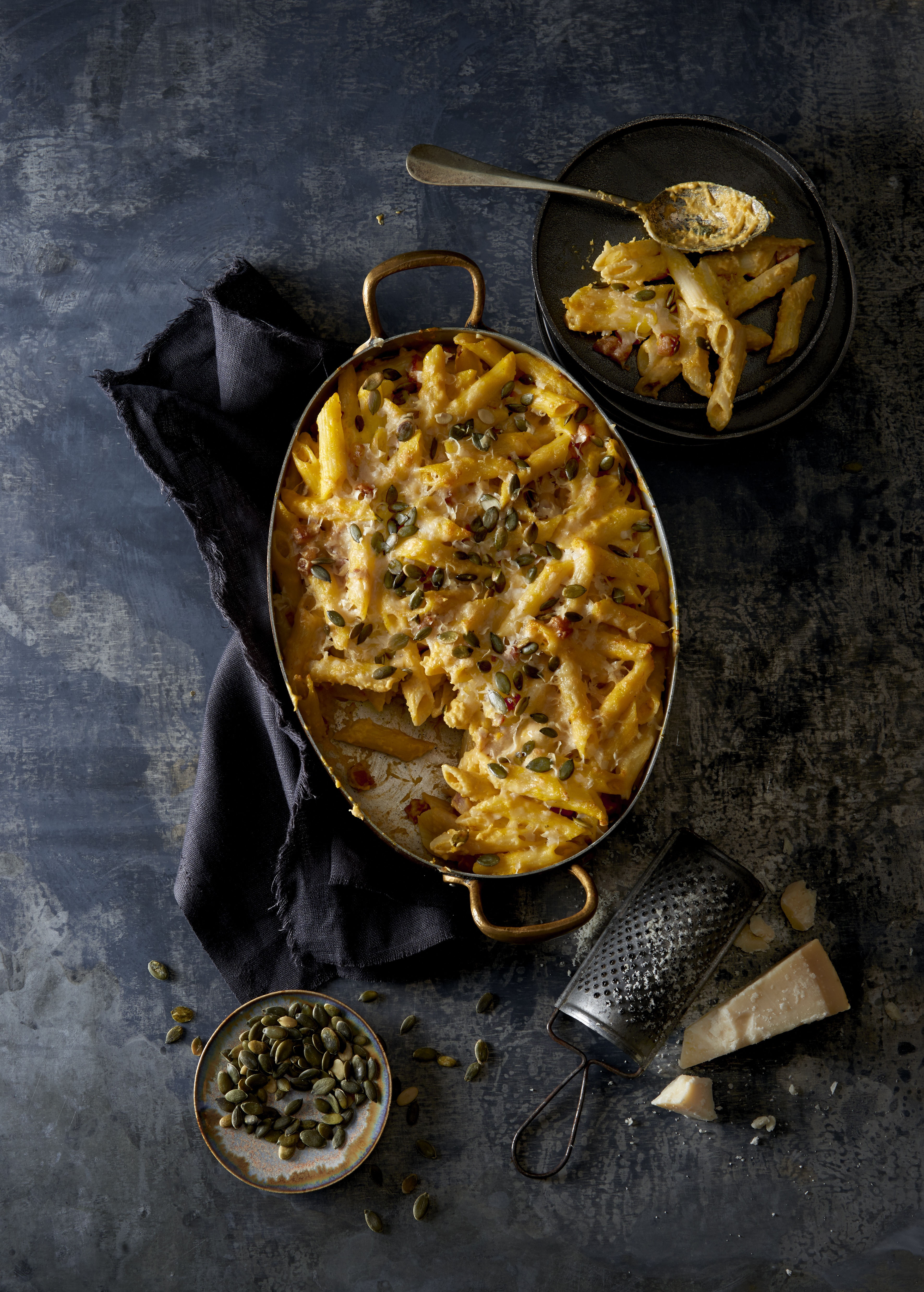 Penne met romige pompoensaus en spekjes