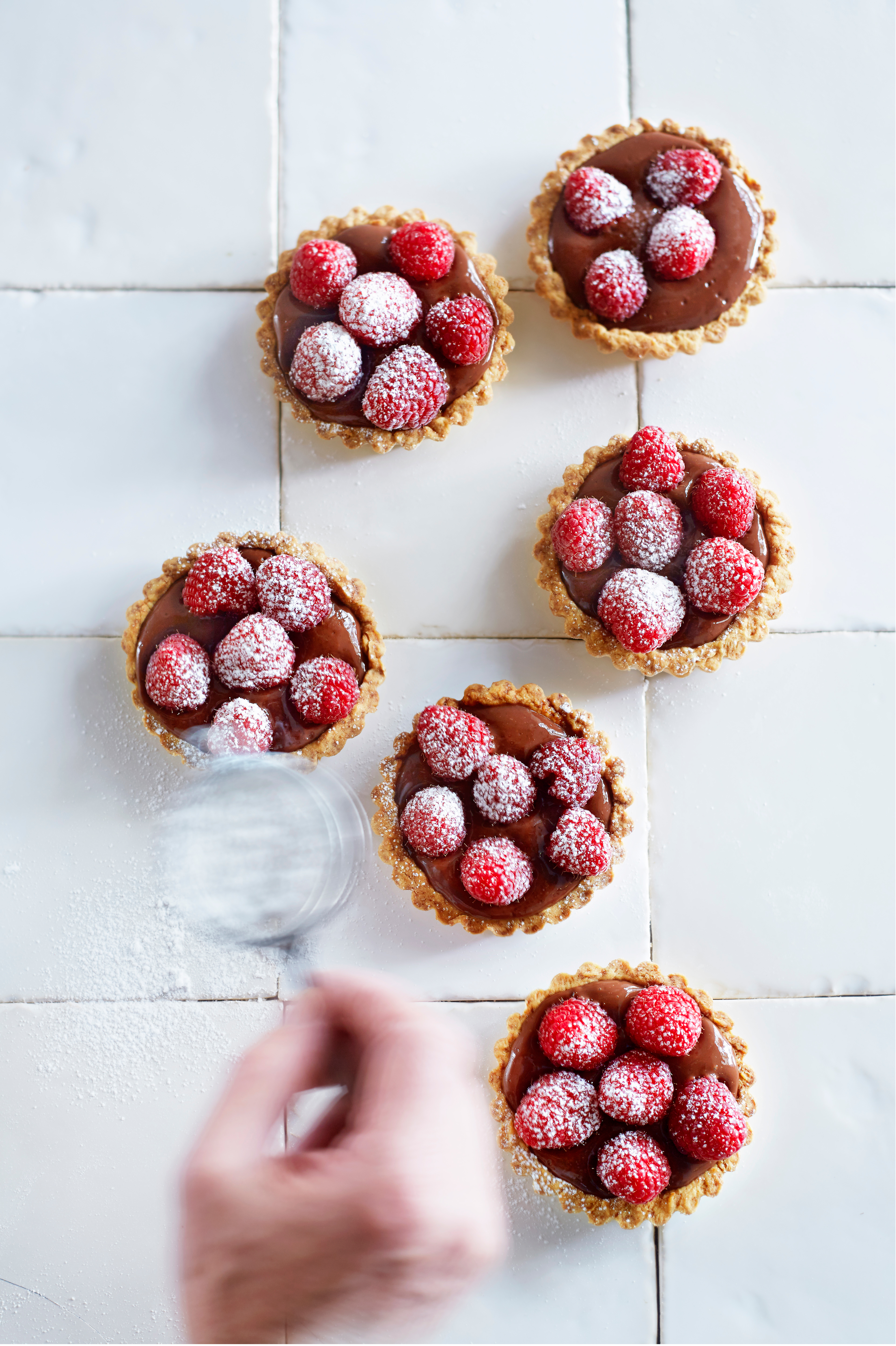 Tartelettes met chocoladevla en frambozen