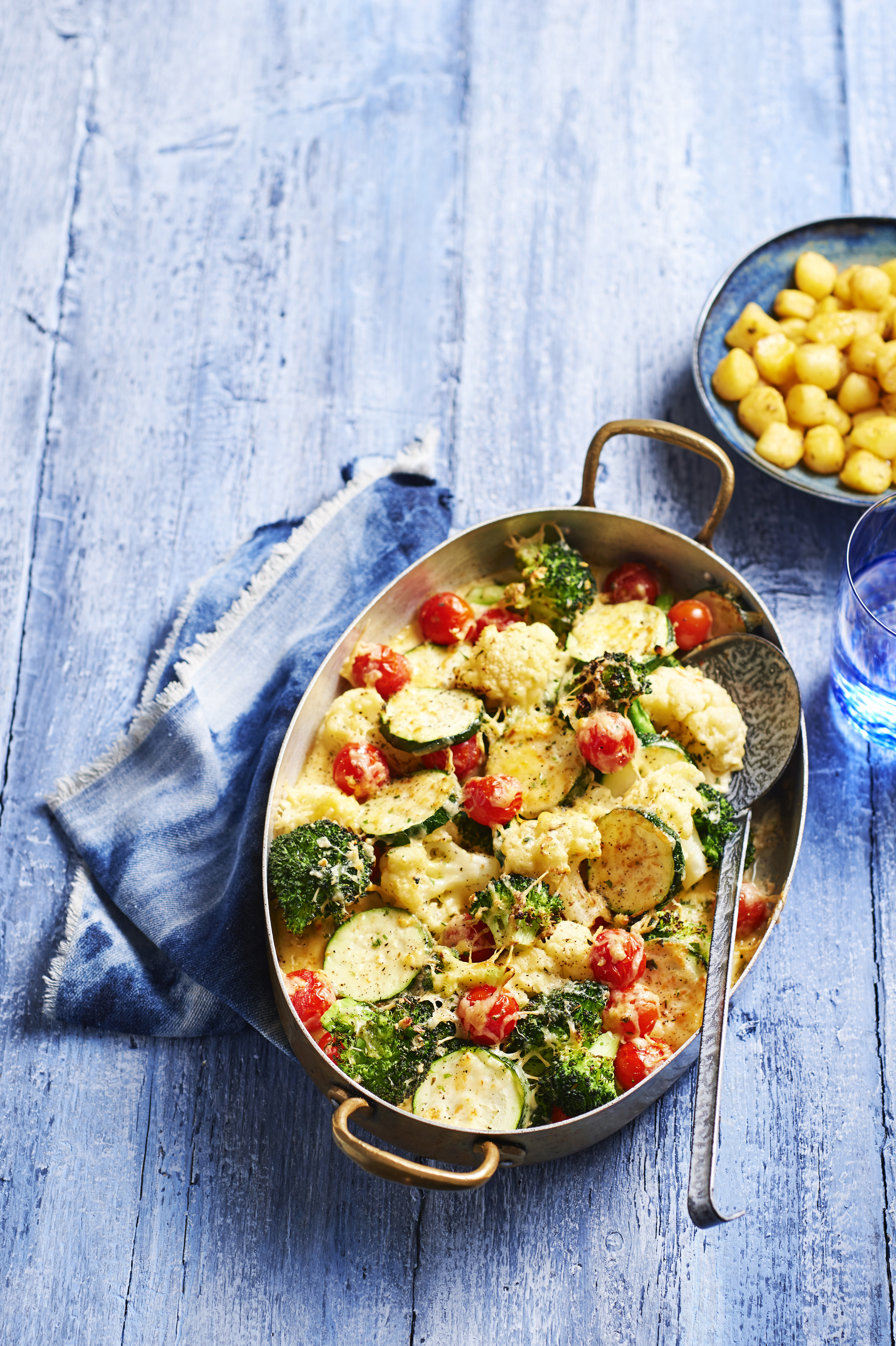 Groentegratin met kruidenboterkrieltjes