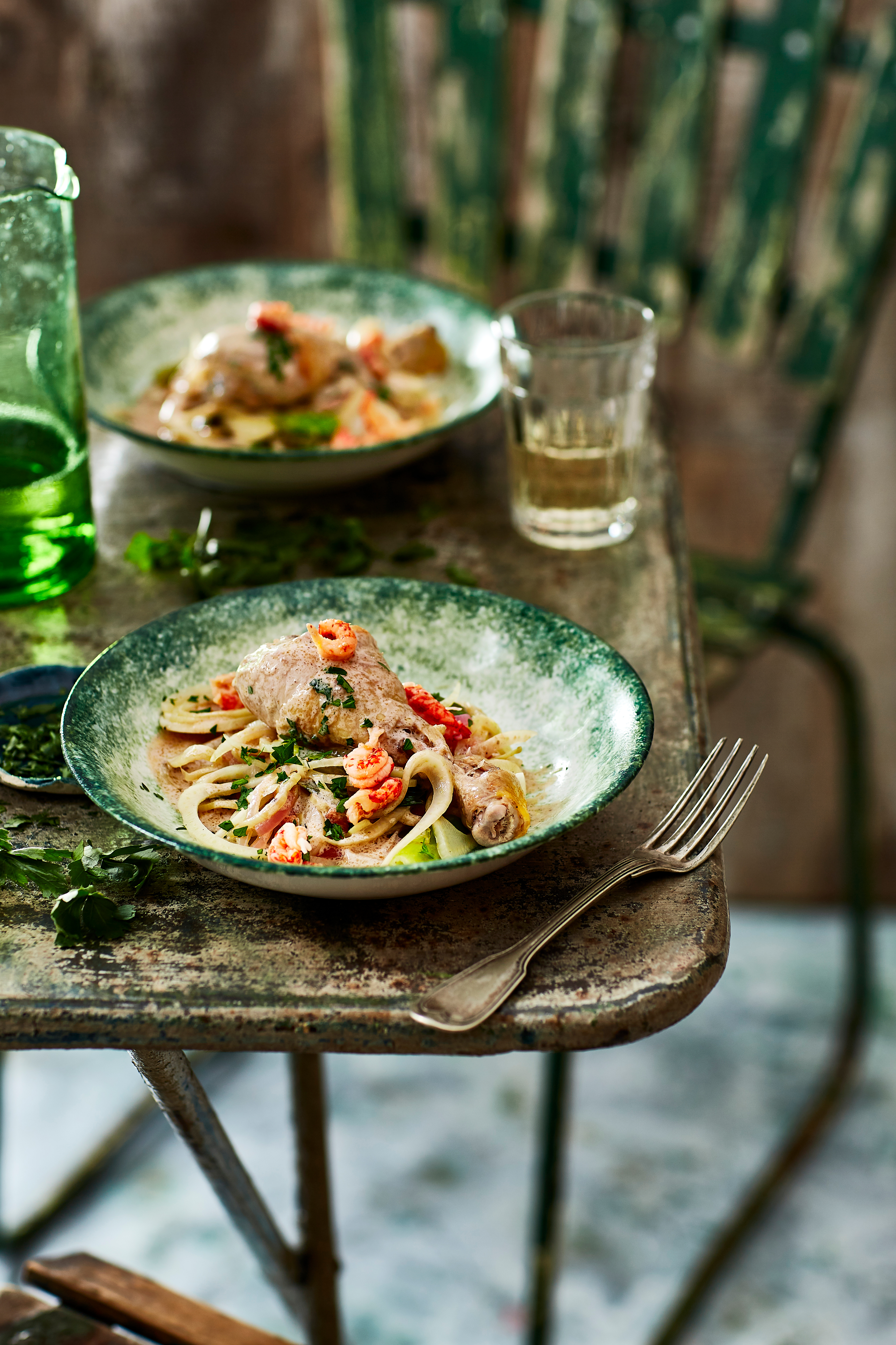 Coq au vin blanc met venkel en rivierkreeftjes