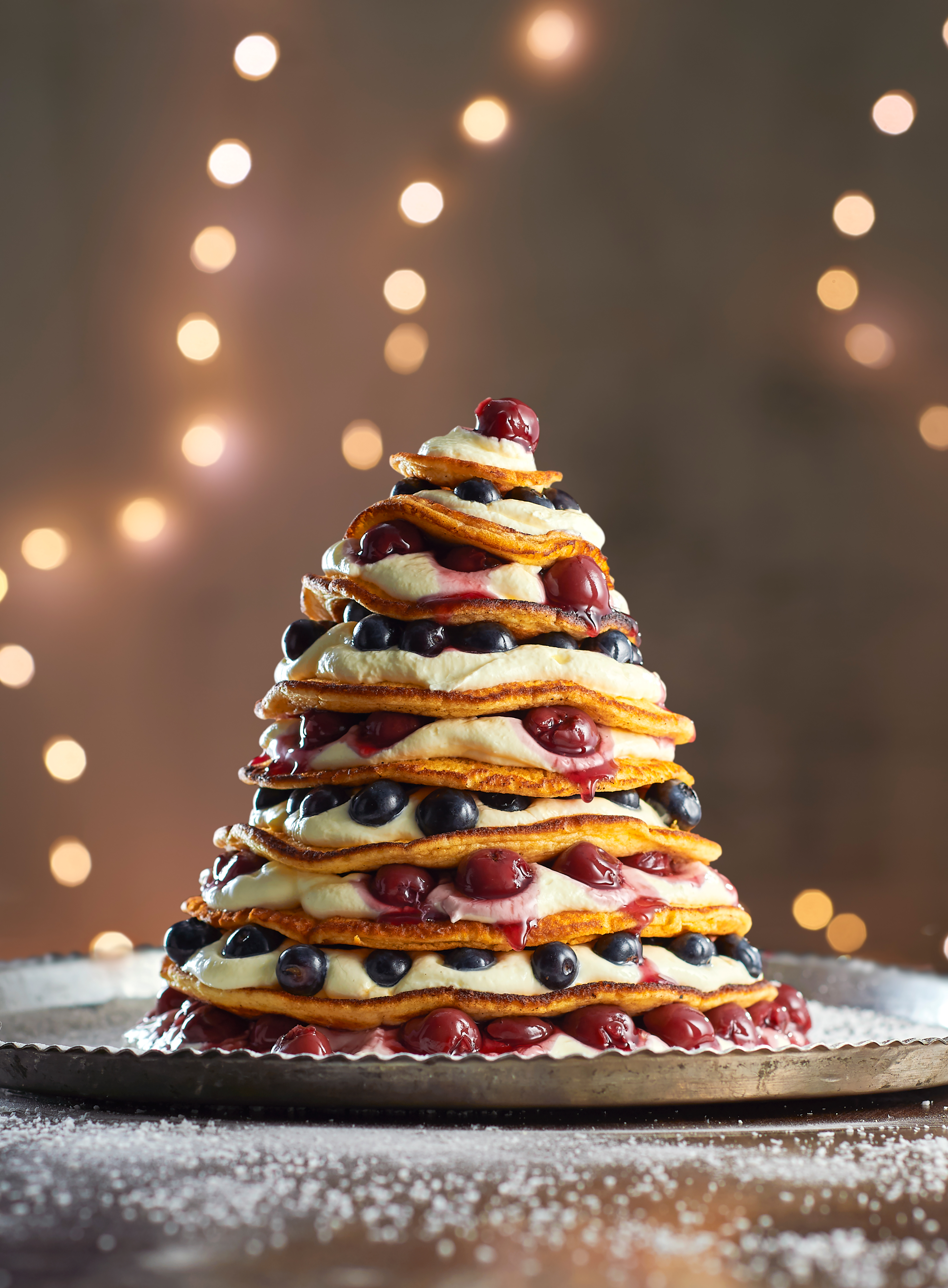 Pancakes met blauwe bessen en kersen