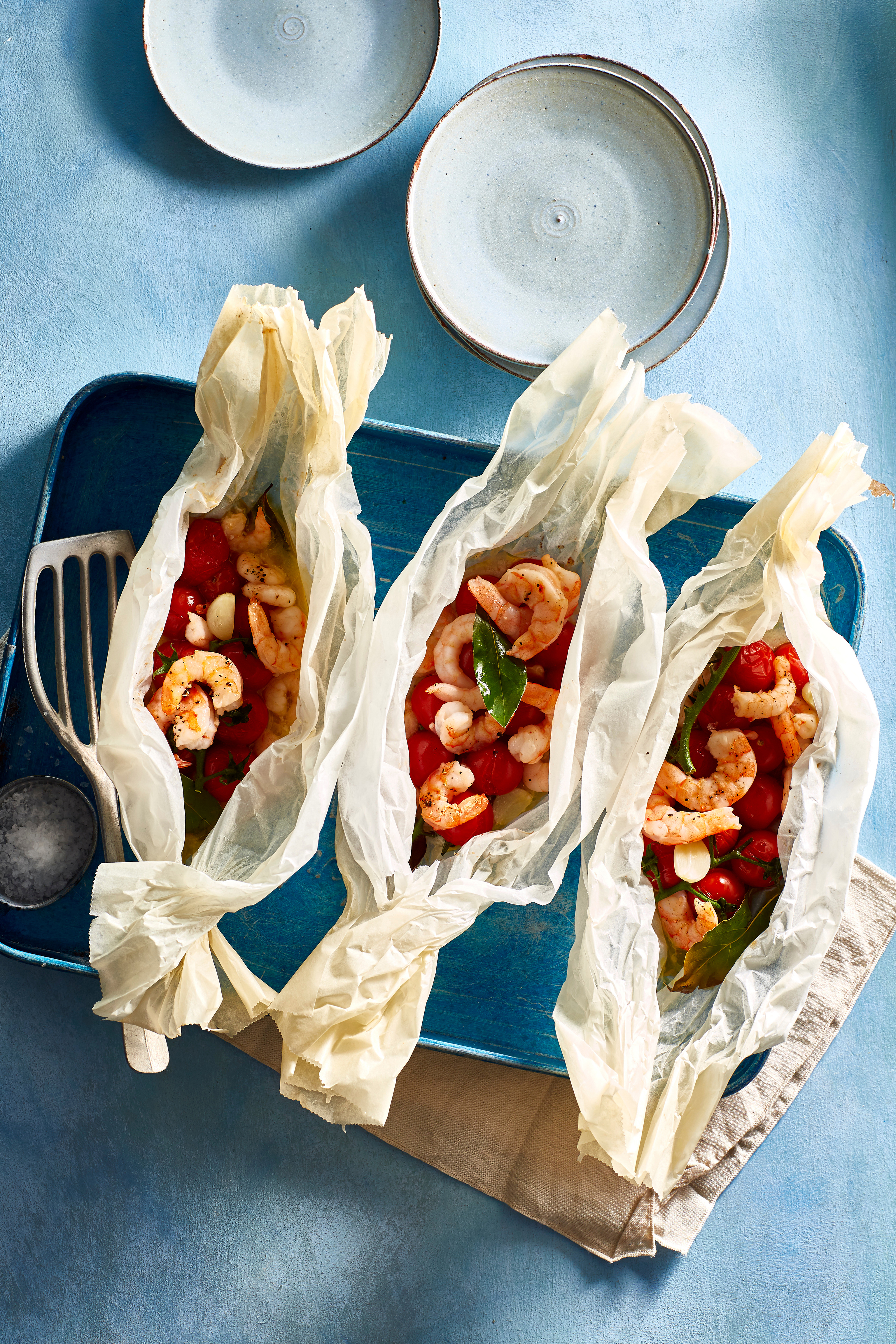 Garnalenpakketje met tomaatjes en knoflook