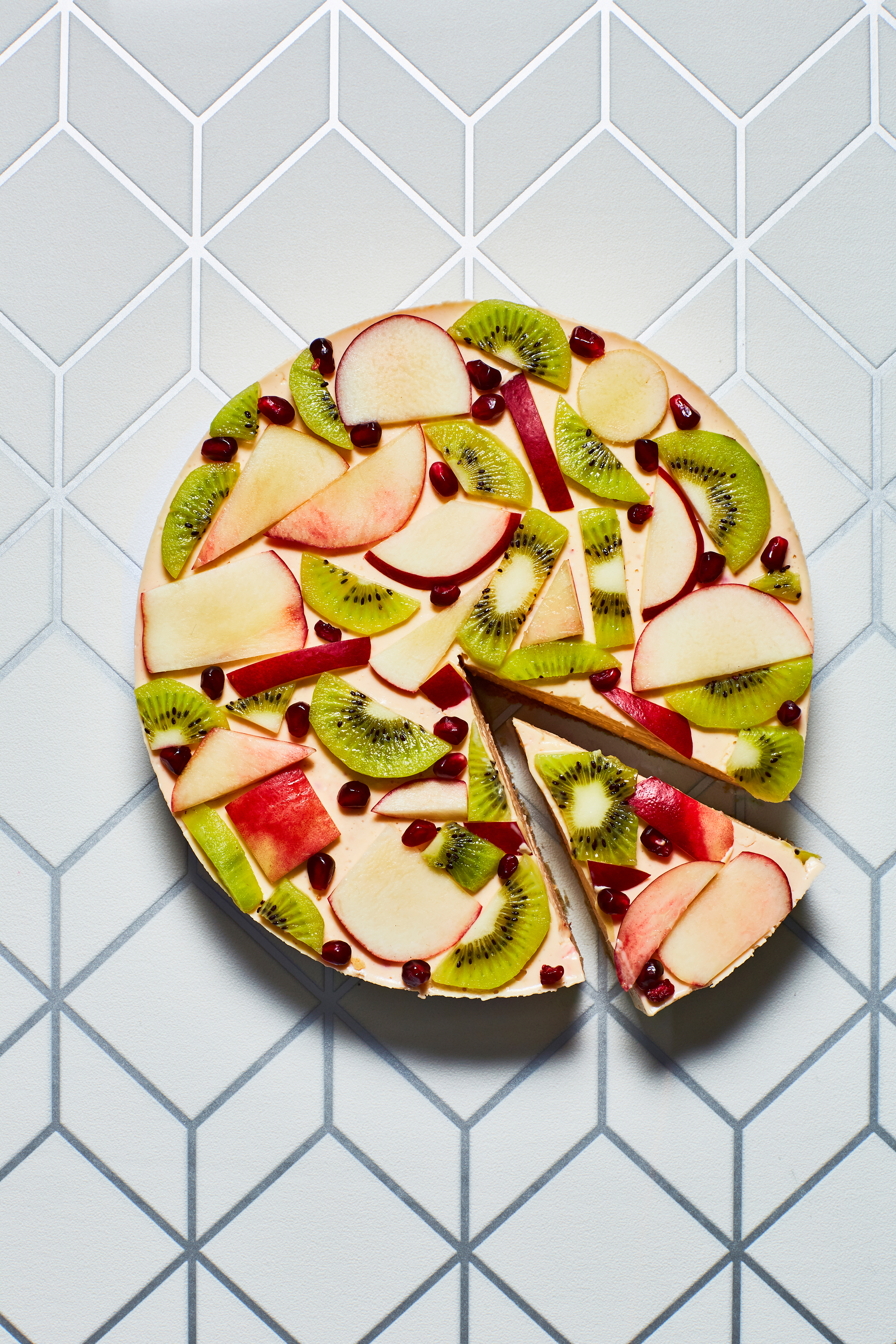 Kokos-cheesecake met nectarine en kiwi