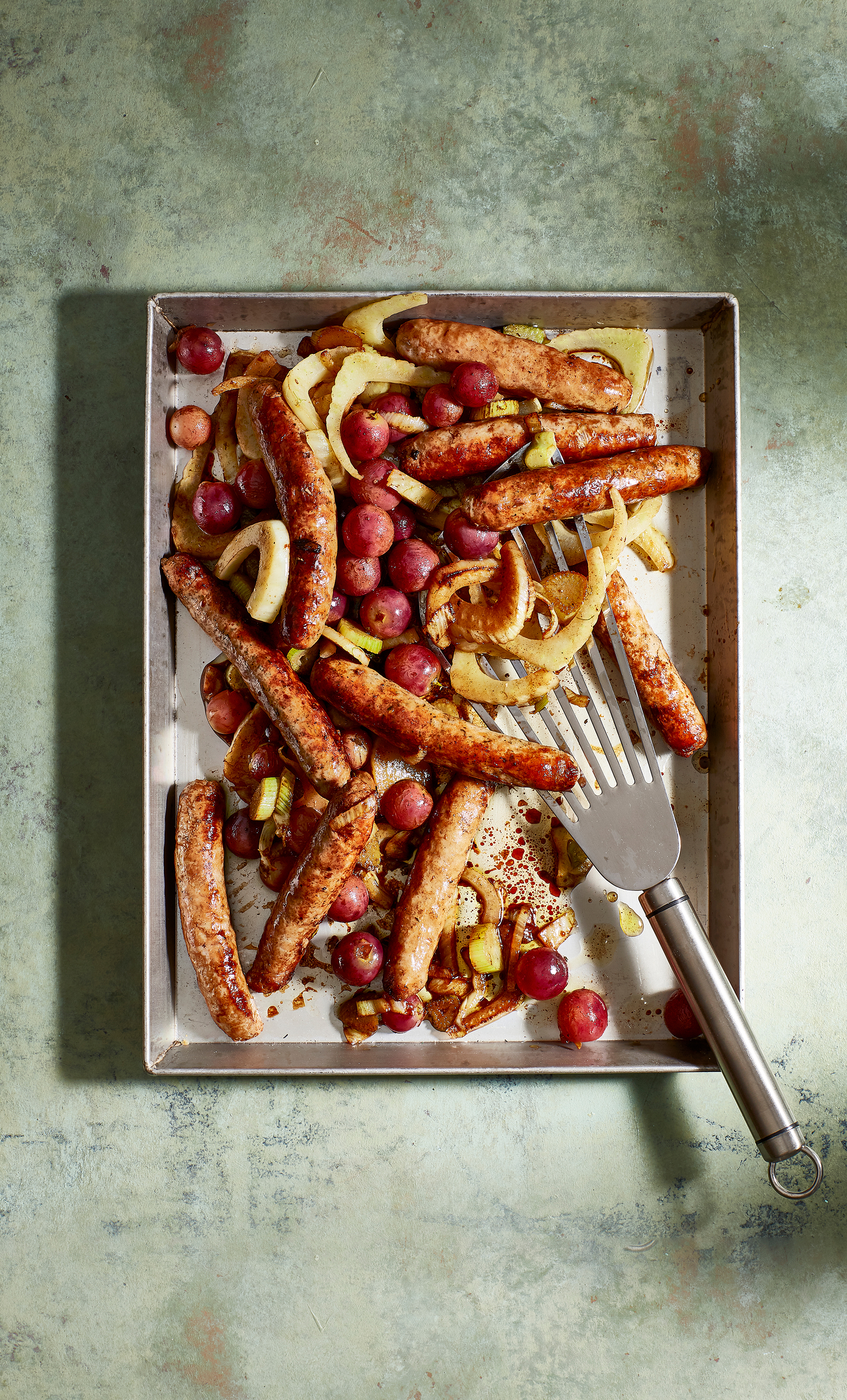 Gebakken worstjes met druiven