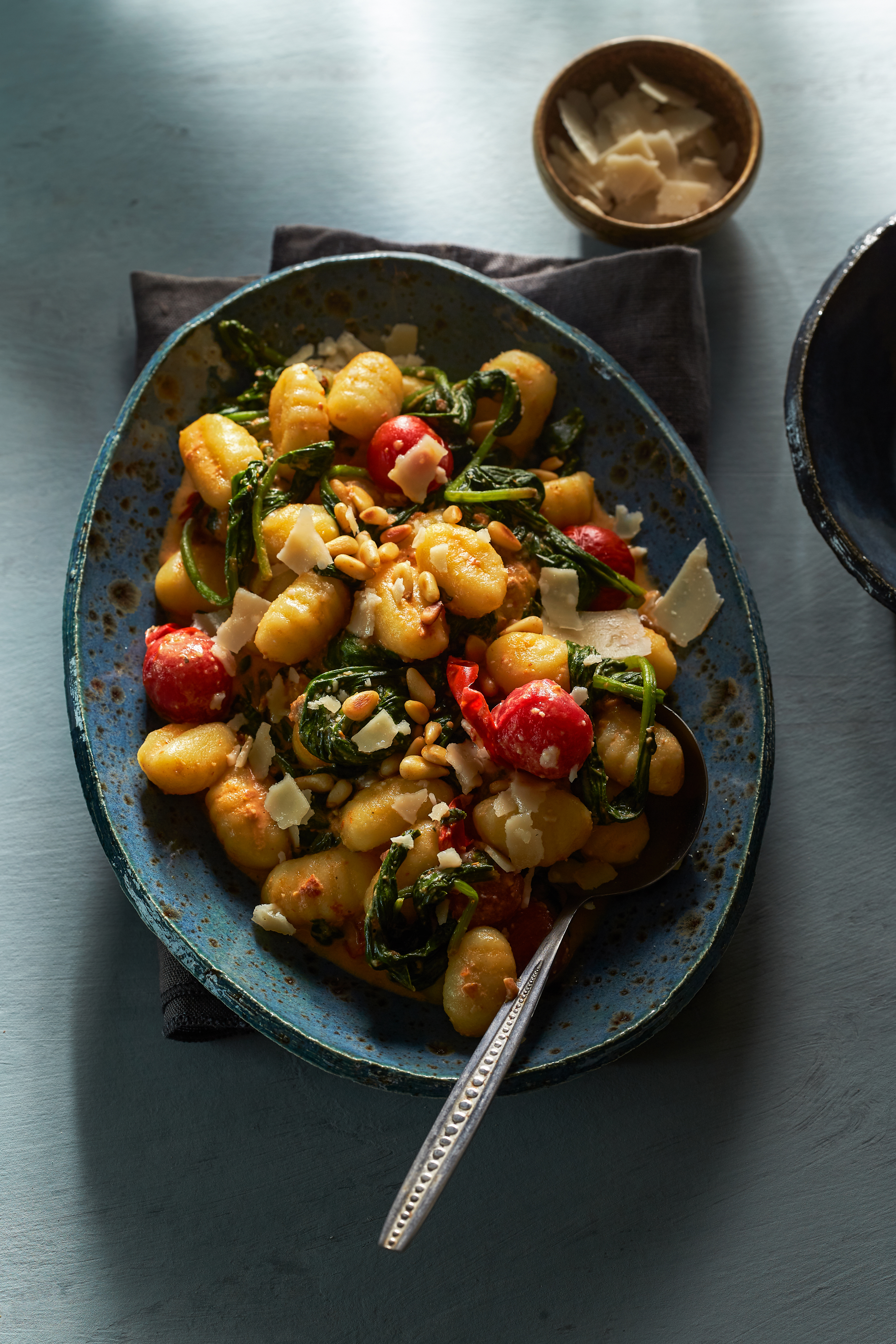 Romige gnocchi met spinazie en tomaat