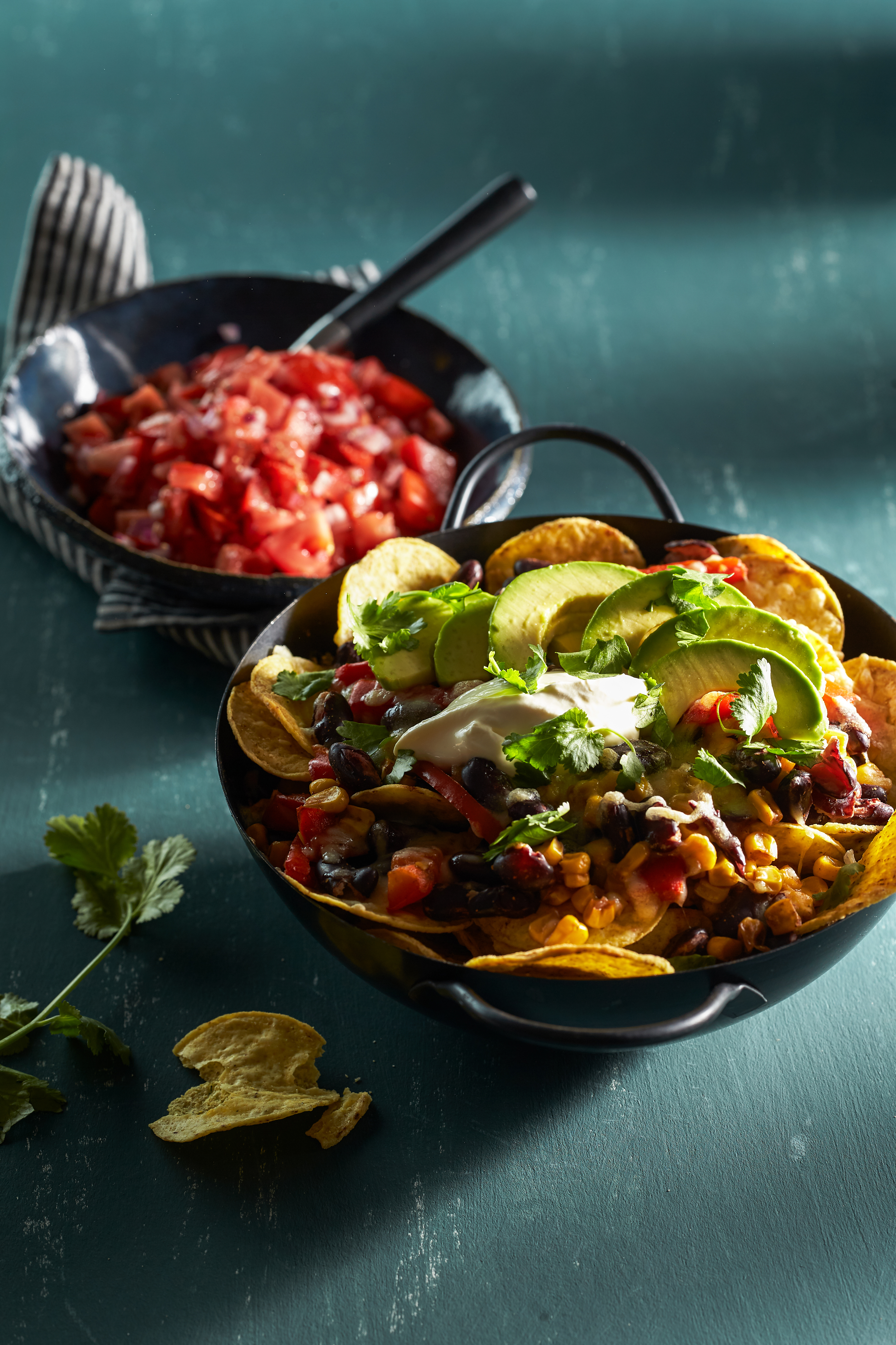 Nacho's met tomatensalsa en avocado
