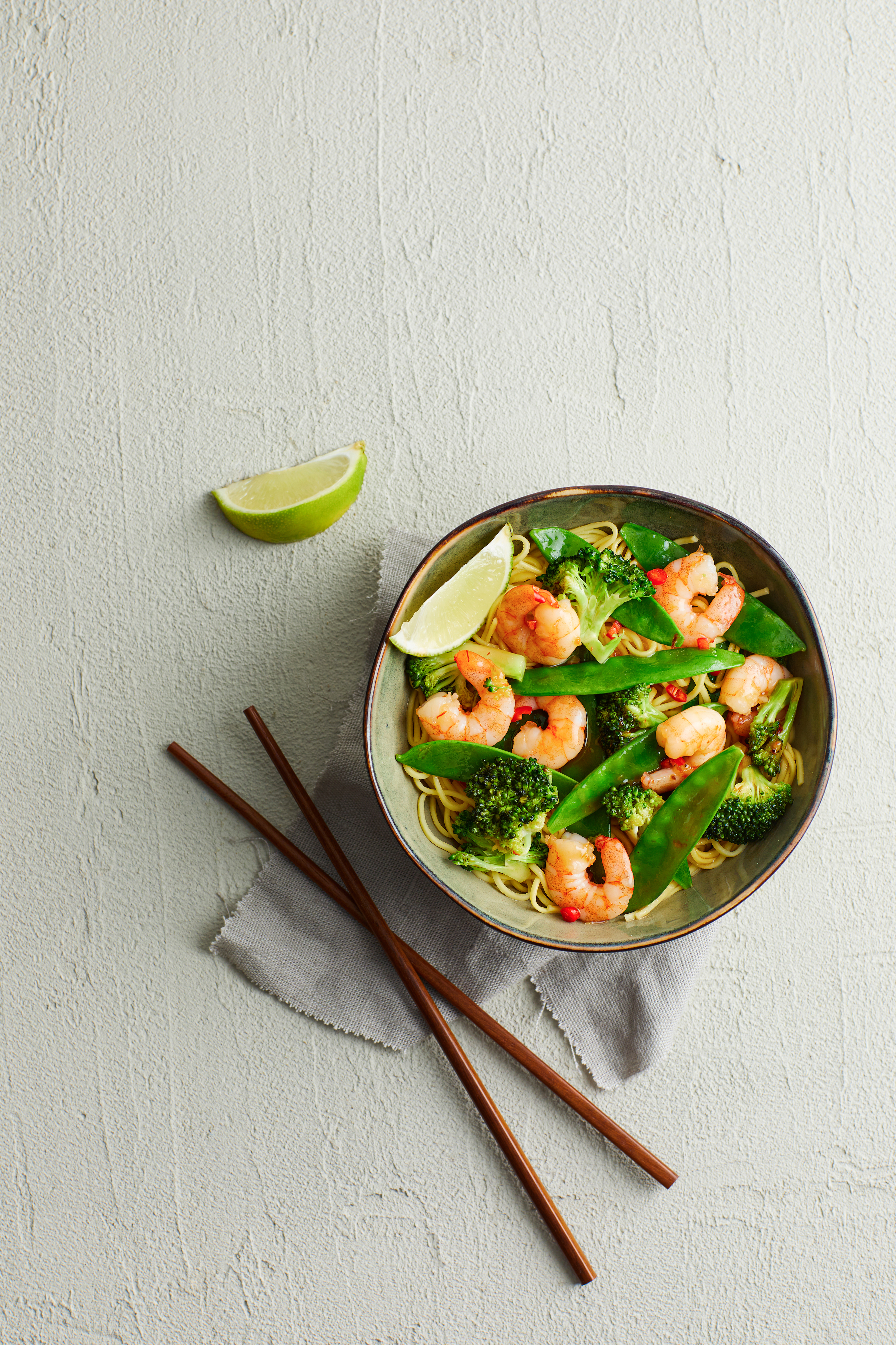 Zoete chiligarnalen met broccoli