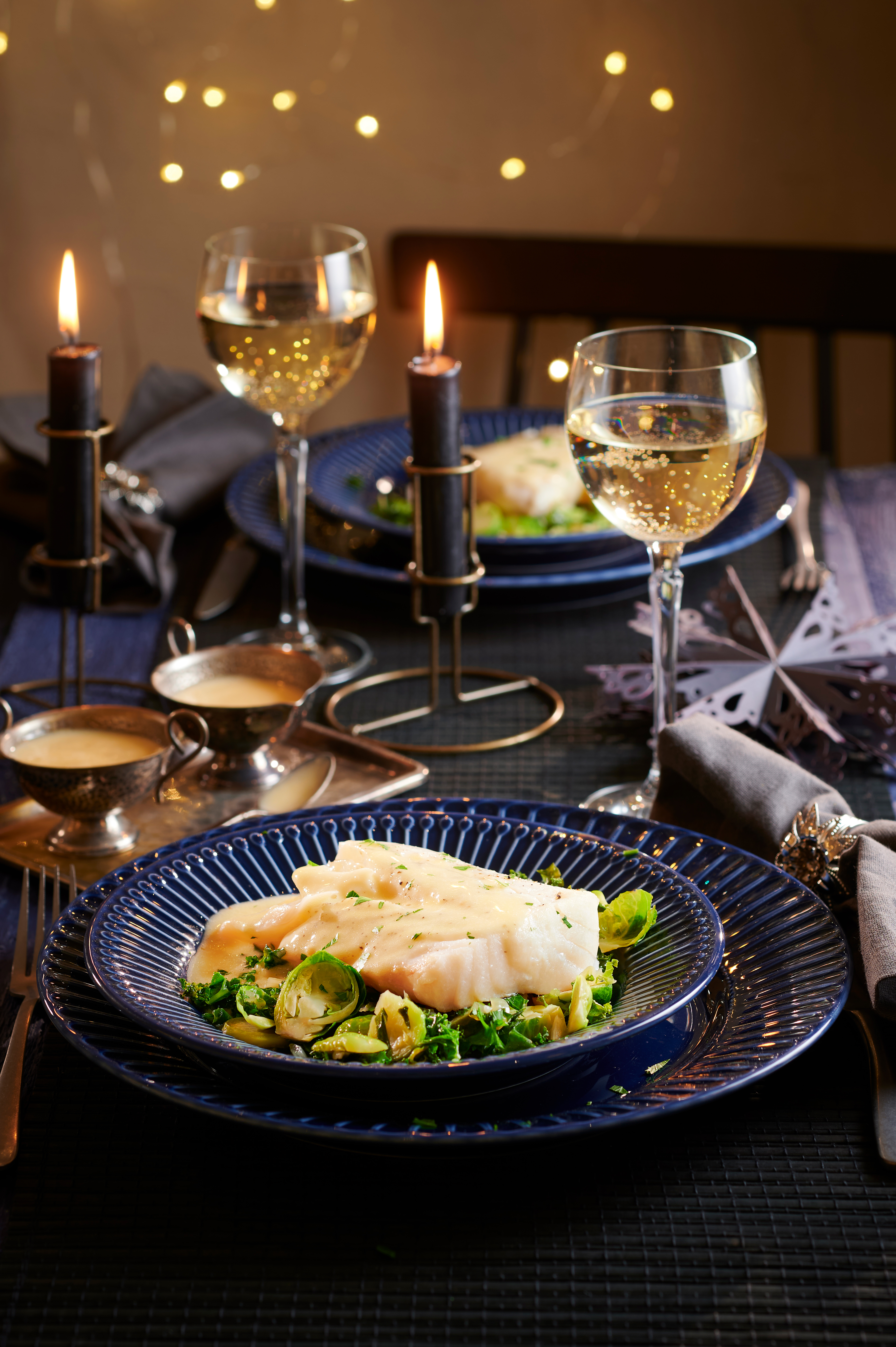 Gestoomde kabeljauwhaasjes op wintergroenten met beurre blanc