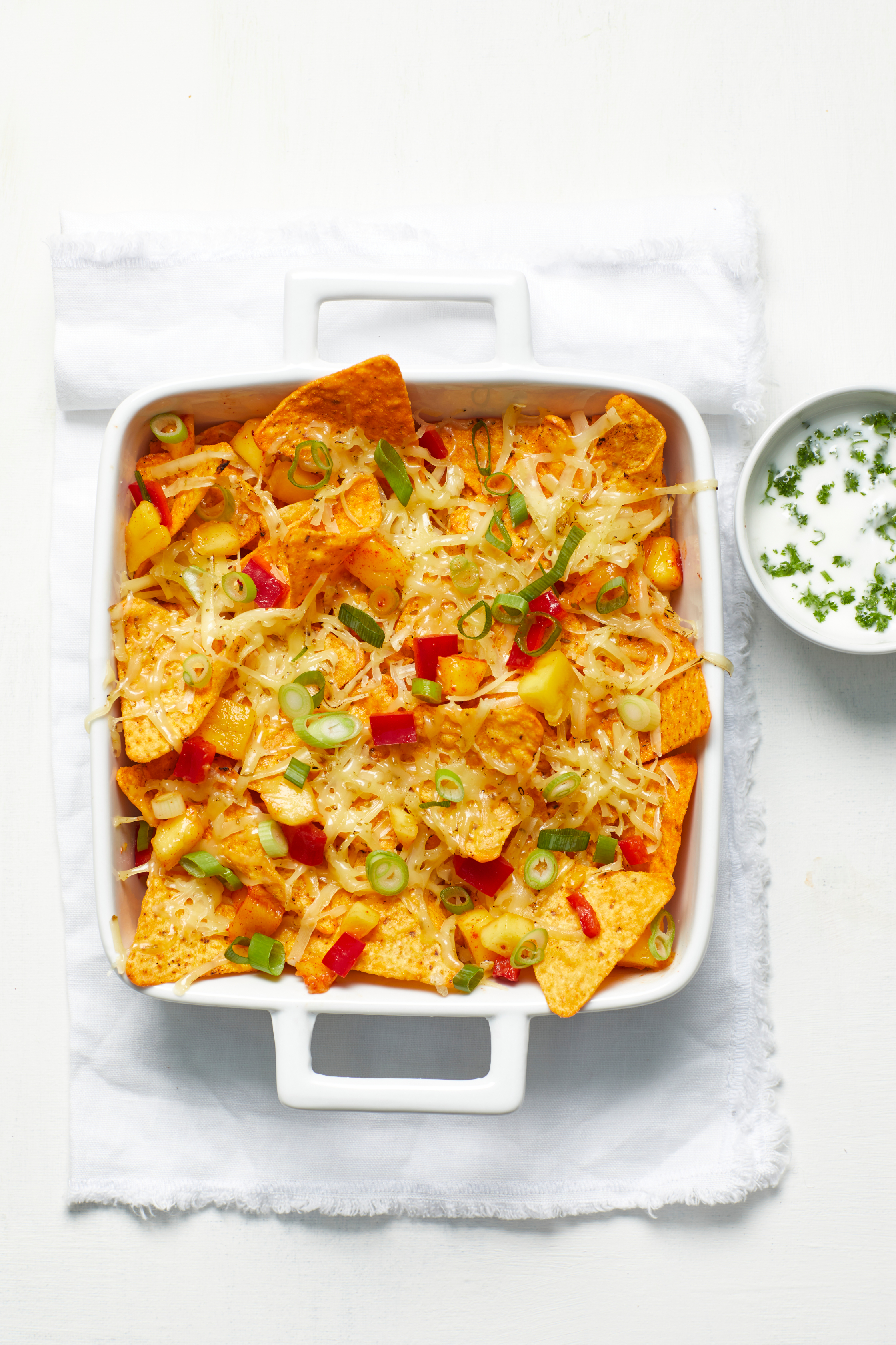 Nacho's met komijnekaas en mangosalsa