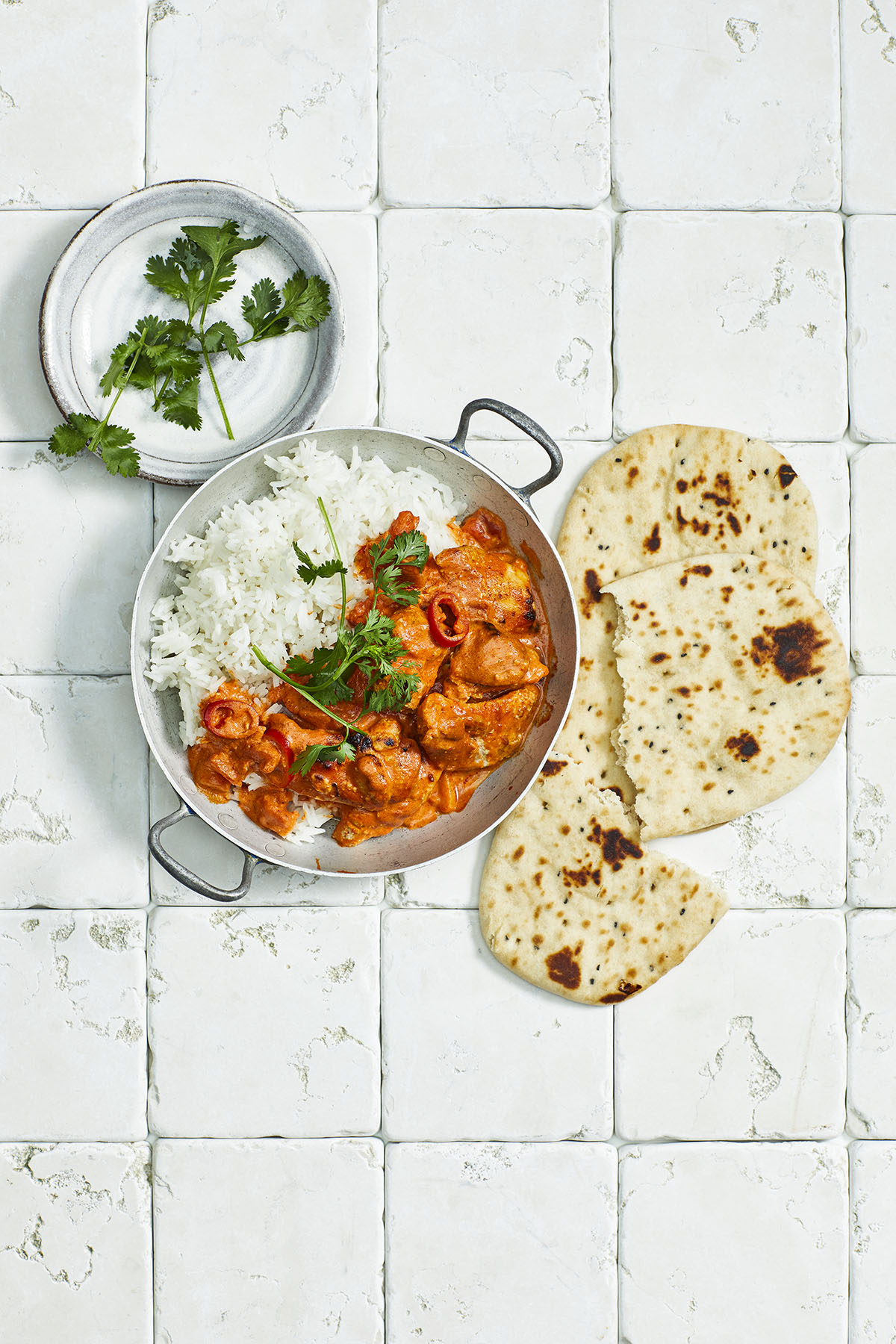 Kip tikka masala met rijst en naan