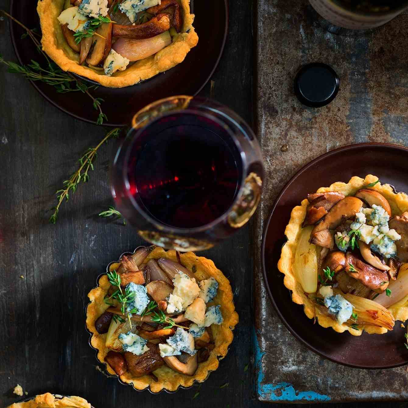Tartelette met paddenstoelen en gorgonzola
