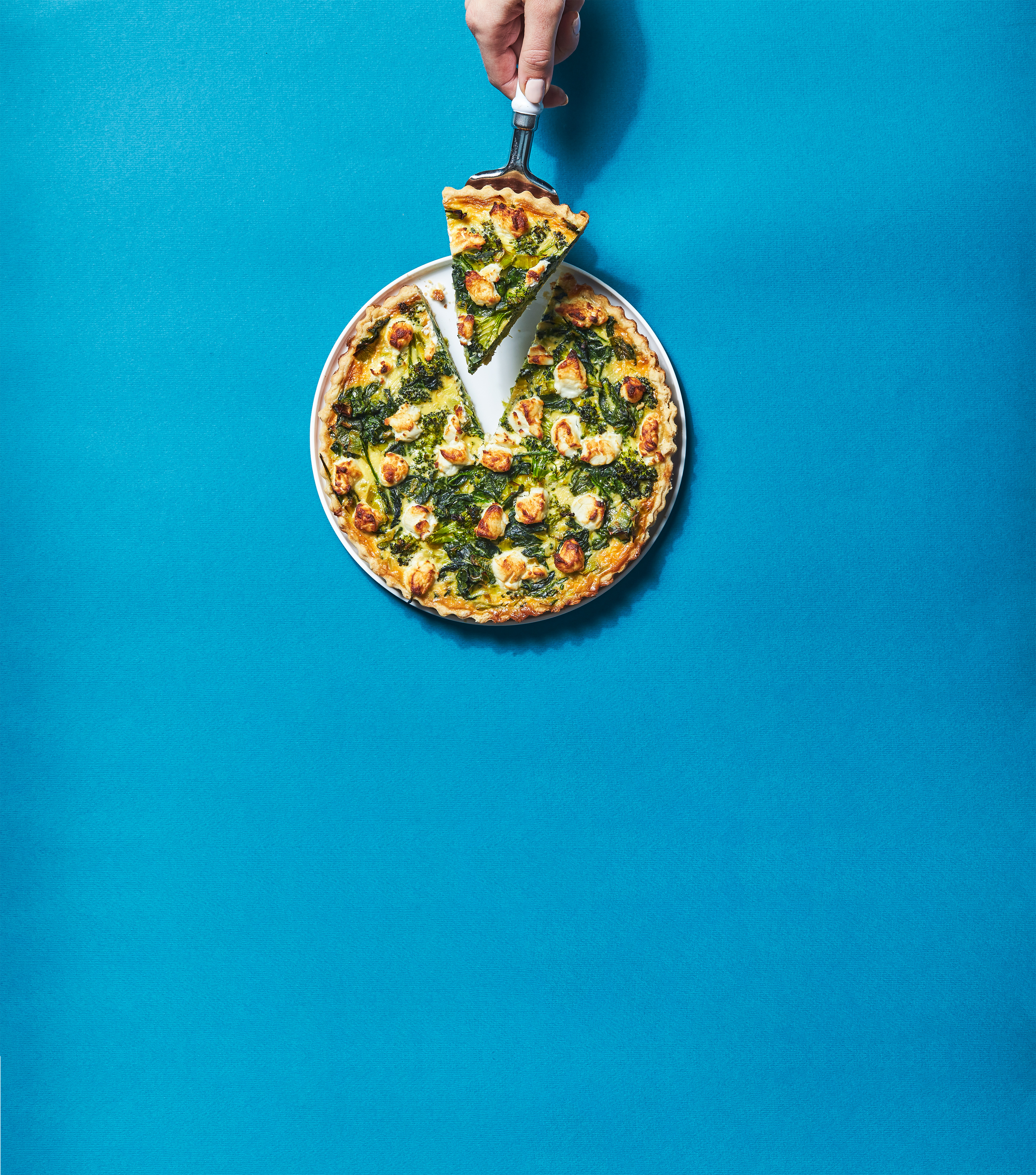 Groene groentequiche met geitenkaas