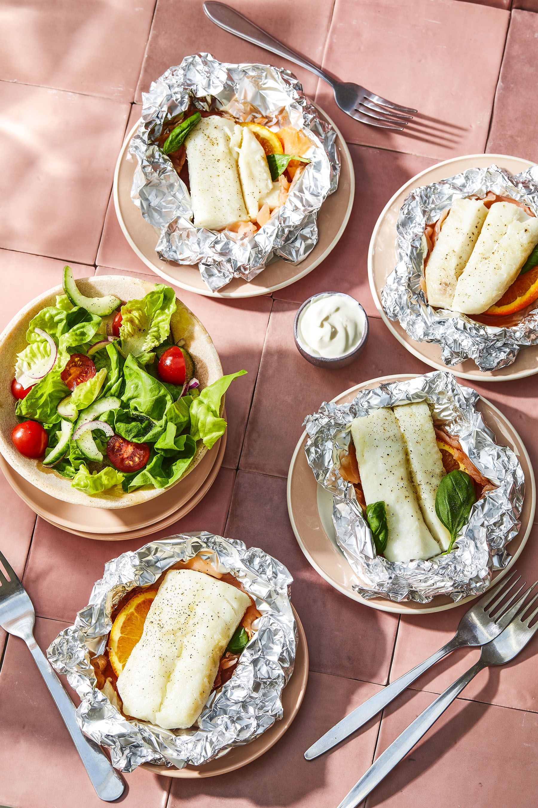 Kabeljauwpakketje met sinaasappel en gerookte zalm