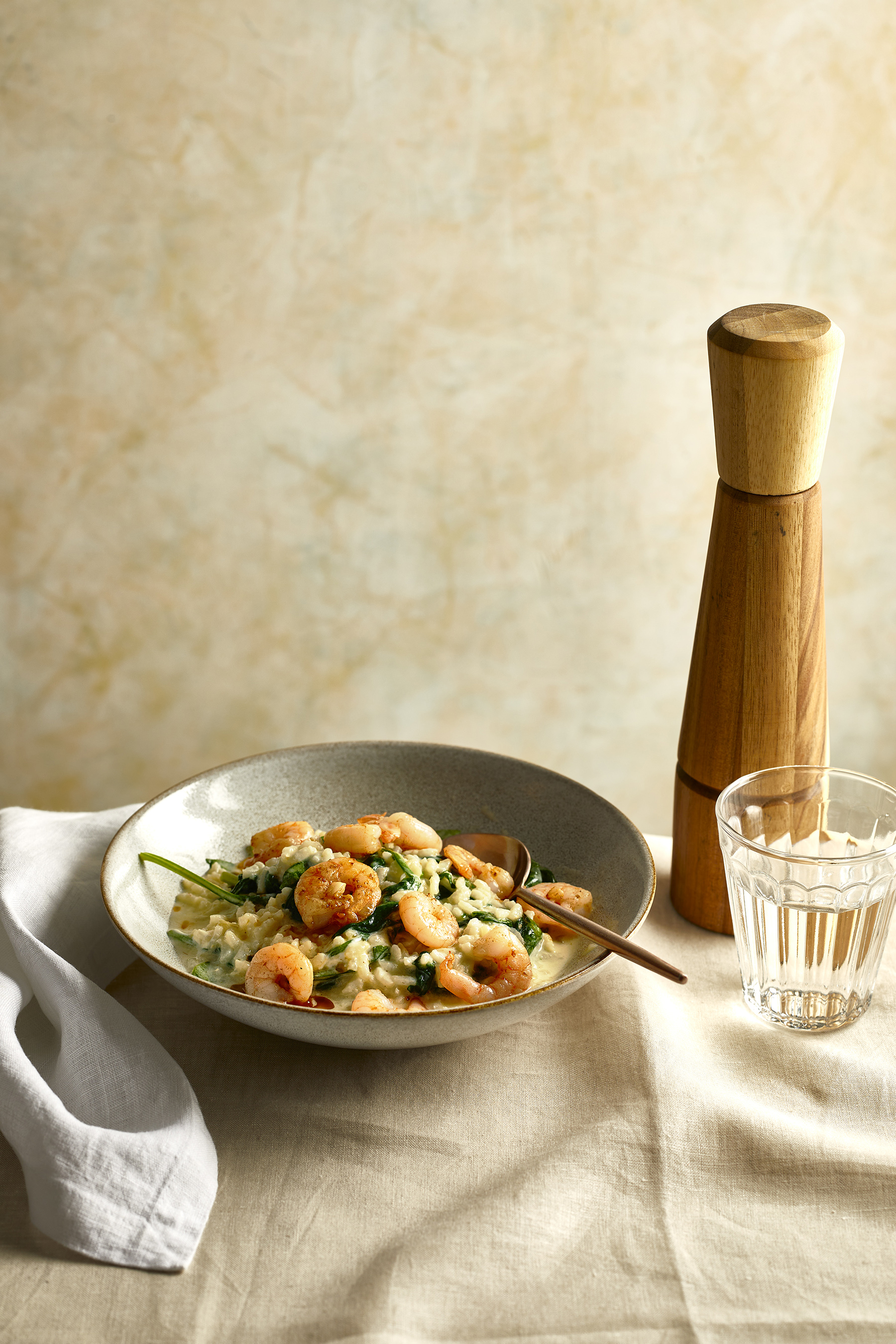 Romige citroenrisotto met knoflookgarnalen