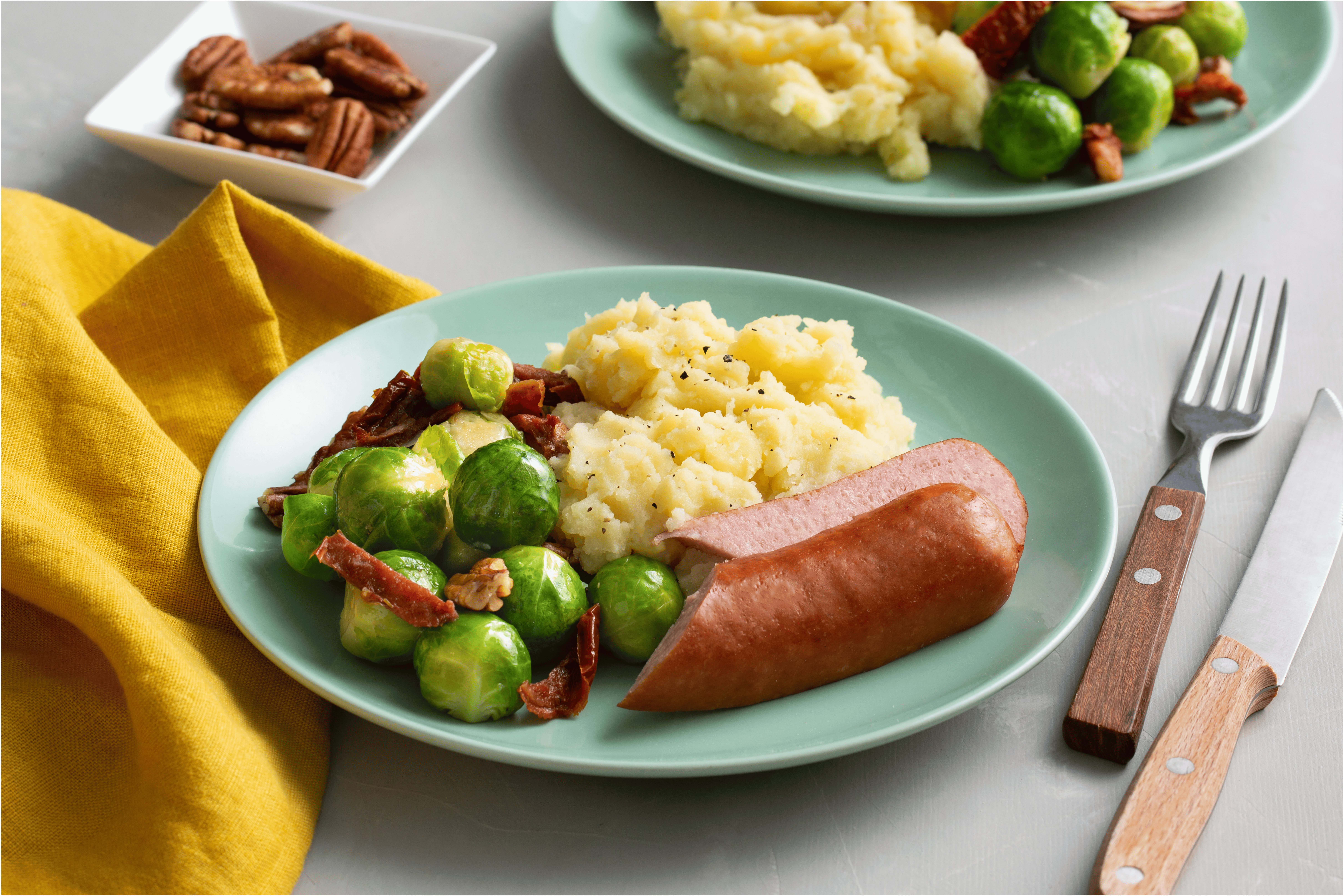 Aardappelpuree met spruitjes en magere rookworst