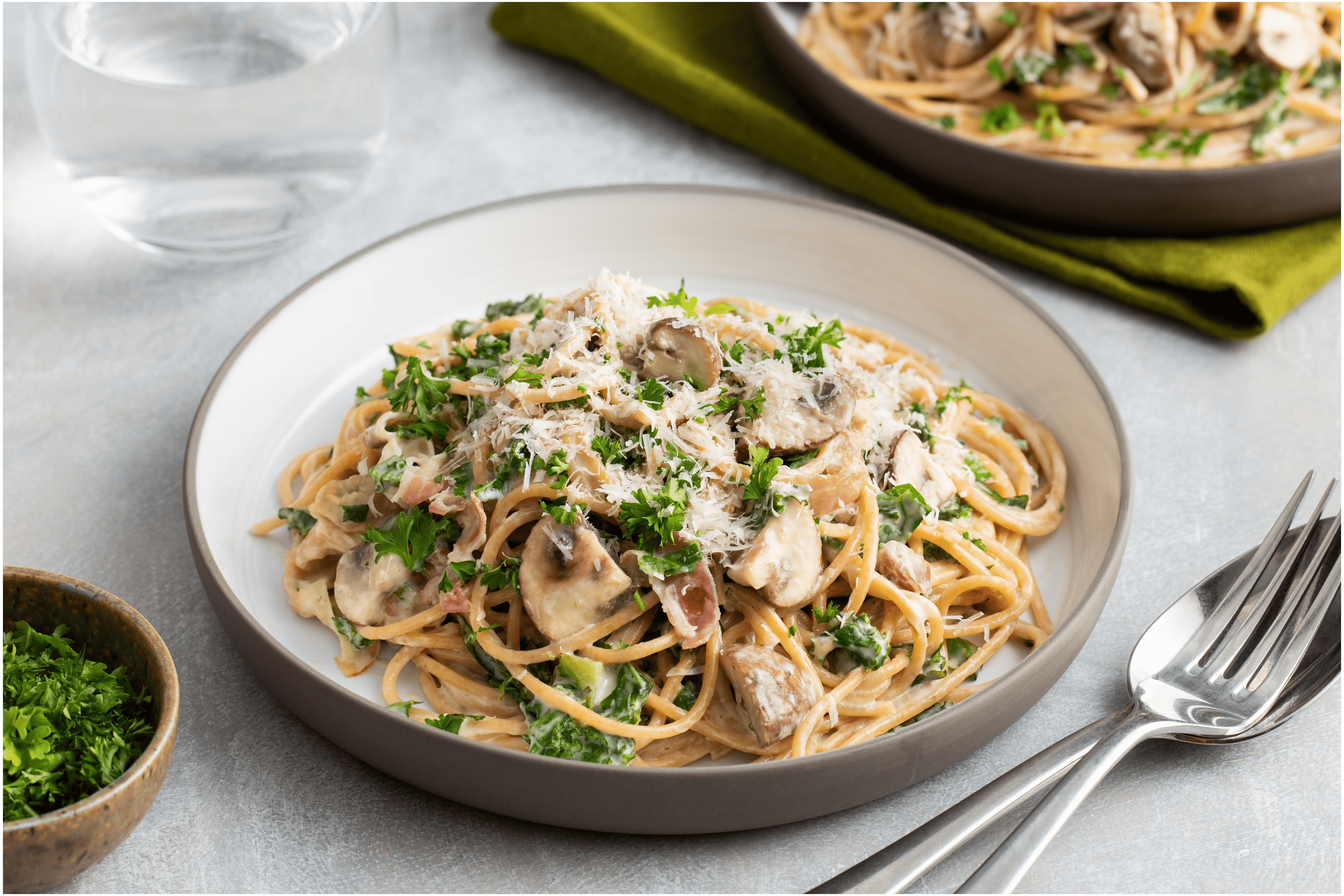 Spaghetti carbonara met champignons en boerenkool